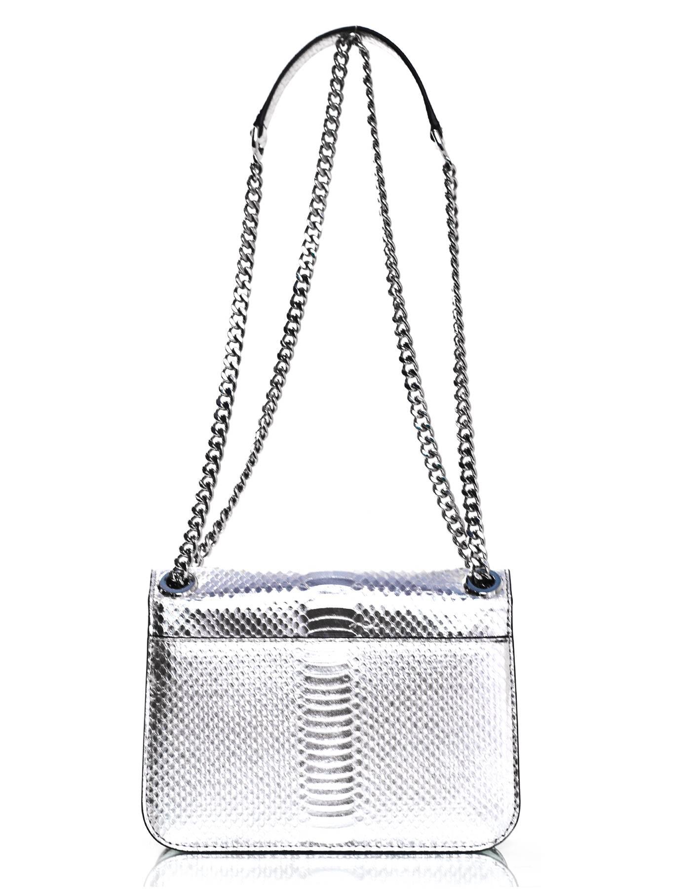 Michael Kors NEW Sloan Editor Silver Embossed Leather Flap Bag 
Features adjustable shoulder strap

Made In: China
Color: Silver
Hardware: Silvertone
Materials: Embossed leather
Lining: Silver logo printed textile
Closure/Opening: Flap top with S