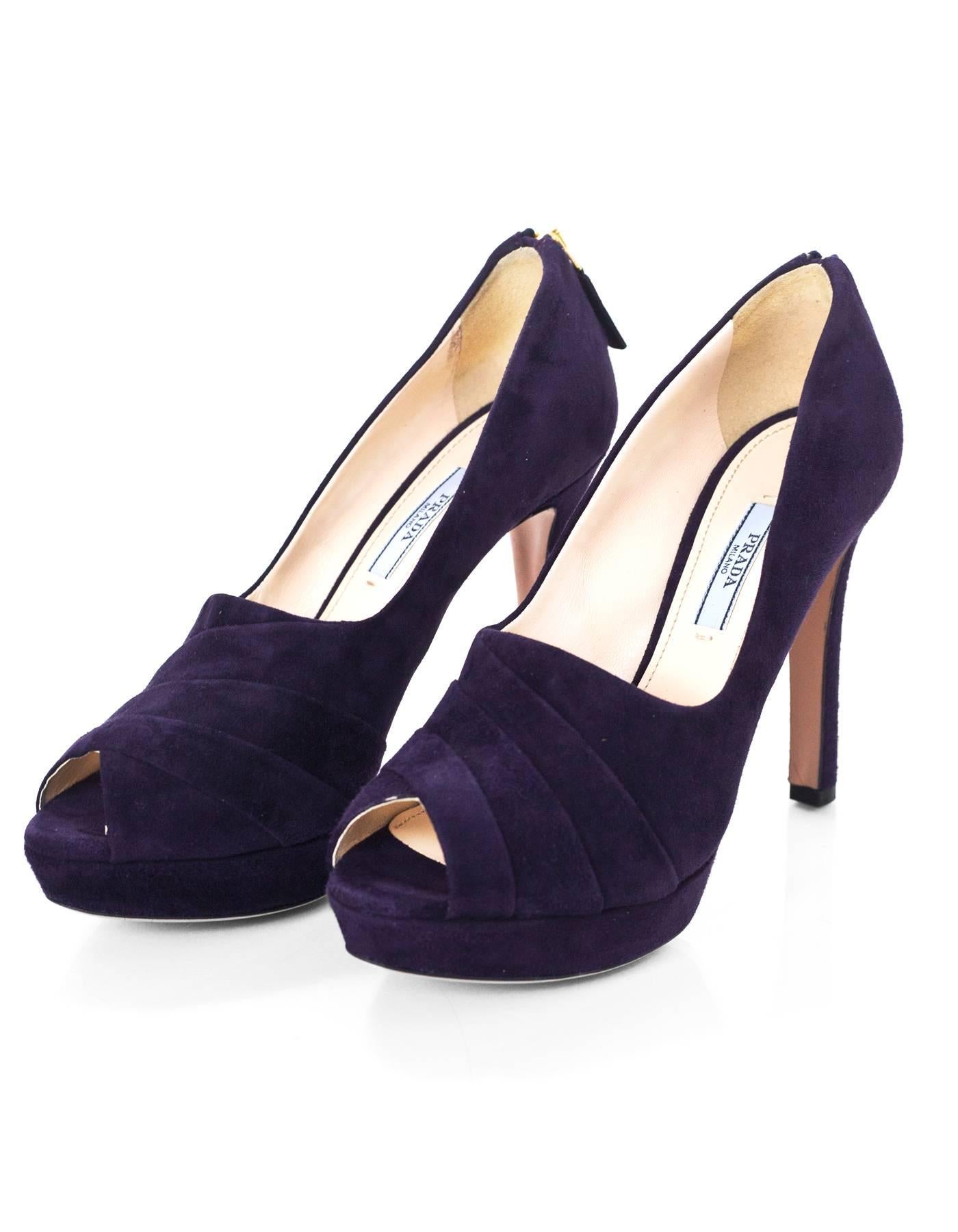 Prada Dark Purple Suede Pumps Sz 38.5 NEW

Features zipper detail at back of heel

Made In: Italy
Color: Dark purple
Materials: Suede
Closure/Opening: Slide on
Sole Stamp: Prada 38.5 Made in Italy
Overall Condition: Excellent pre-owned condition -