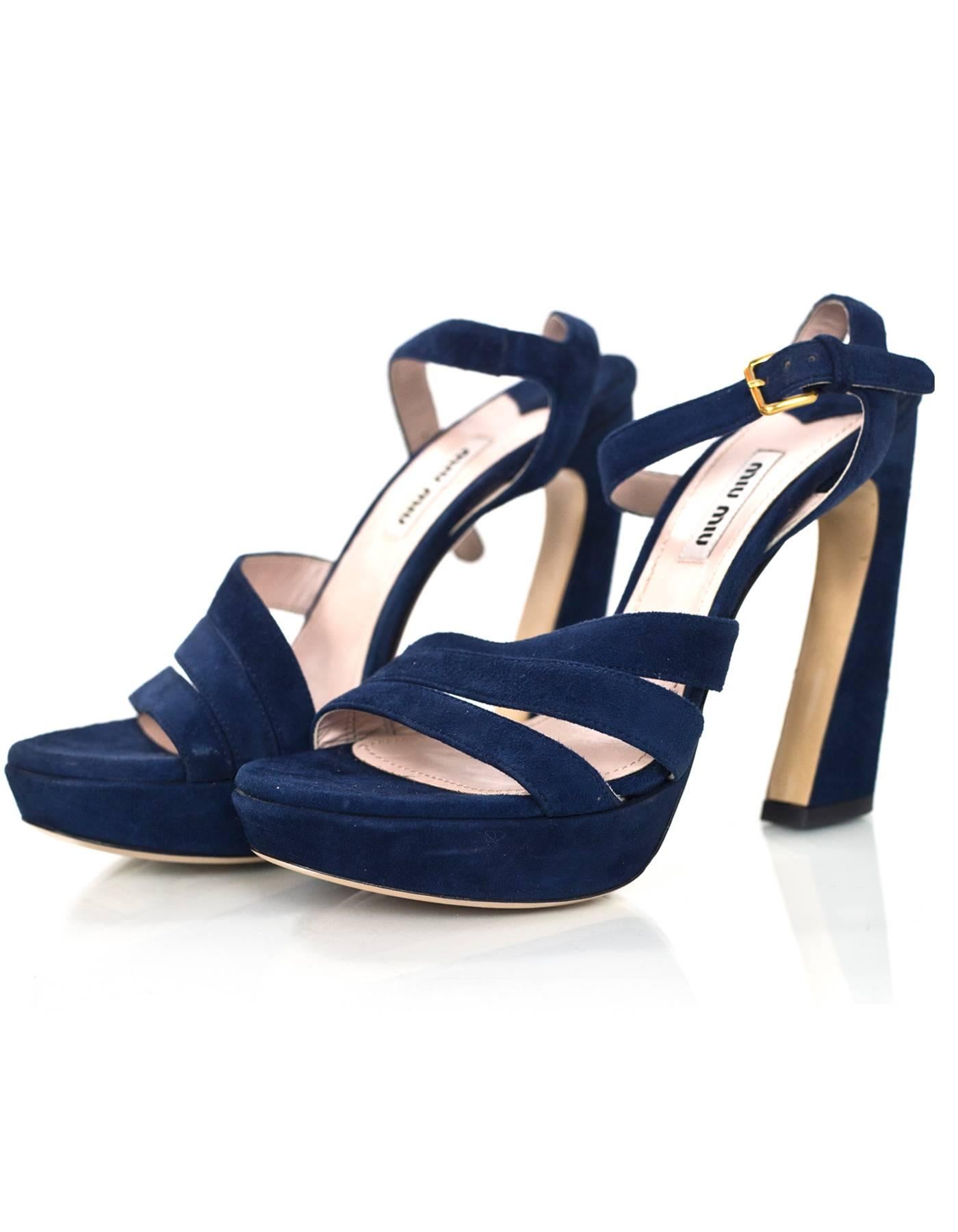 Miu Miu Blue Suede Sandals Sz 36.5 NEW

Made In: Italy
Color: Blue
Materials: Suede
Closure/Opening: Buckle closure at ankle
Sole Stamp: Miu Miu Made in Italy 36.5
Retail Price: $675 + tax
Overall Condition: Excellent pre-owned condition - new, no