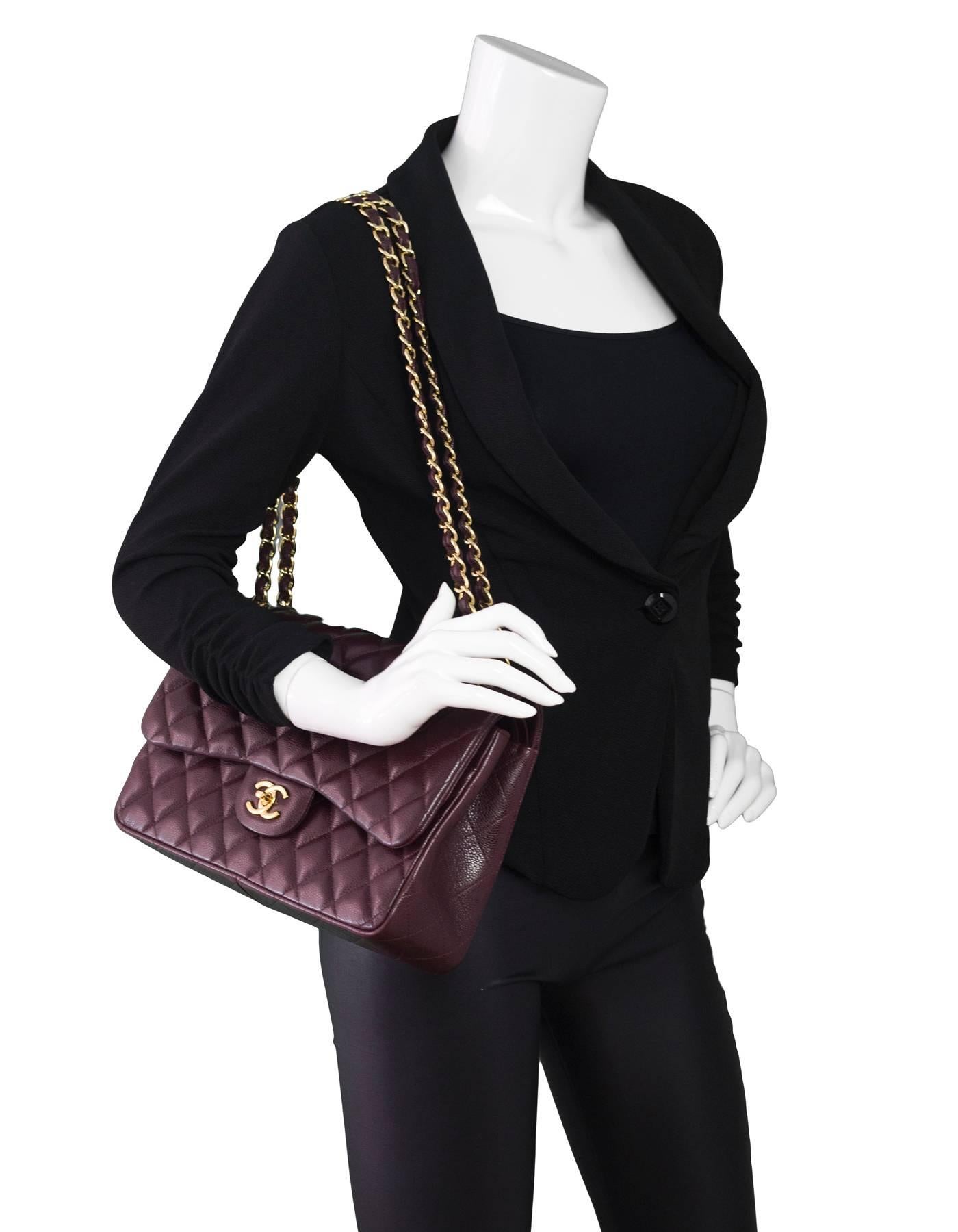 Chanel Eggplant Quilted Caviar Jumbo Double Flap Bag 

Made In: Italy
Year of Production: 2012
Color:  Rich burgundy/eggplant
Hardware: Goldtone
Materials: Caviar leather, metal
Lining: Leather
Closure/opening: Flap top with CC twist lock
Exterior
