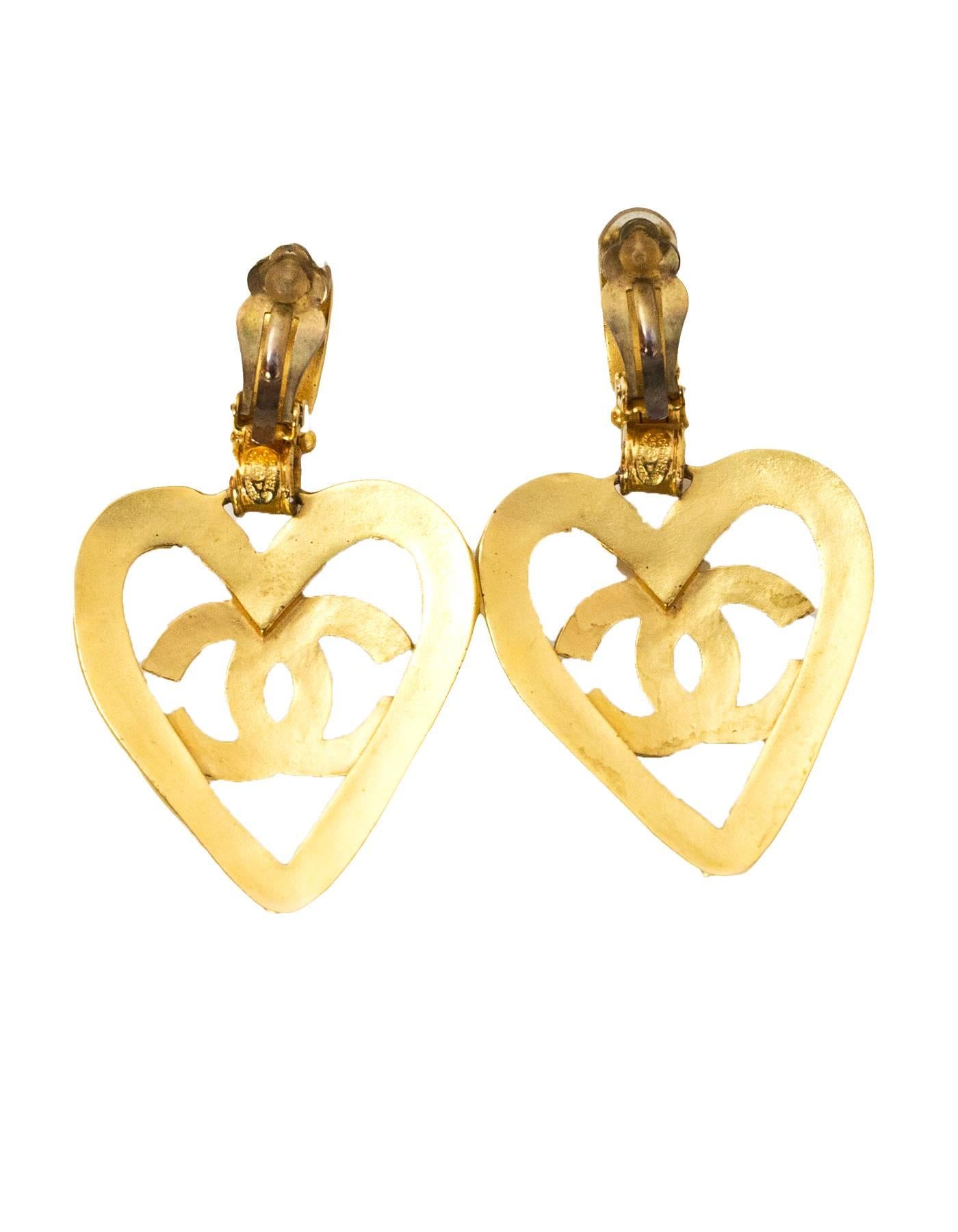 Chanel Large CC Heart Clip-On Earrings

Made In: France
Year of Production: 1995
Color: Gold
Materials: Metal
Closure: Clip on
Stamp: Chanel 95 CC Made In France
Overall Condition: Excellent pre-owned condition
Included: Chanel box

Measurements: