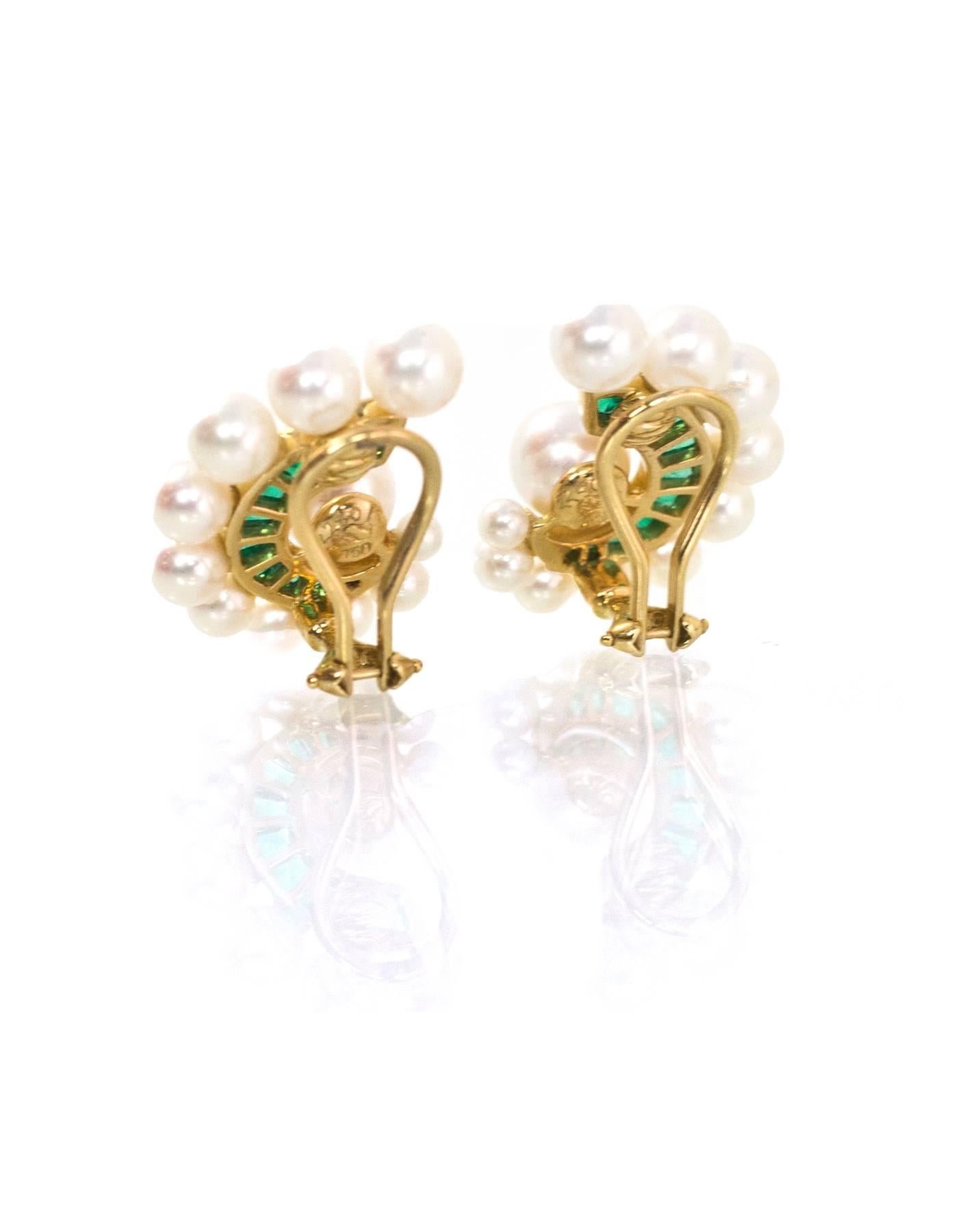 Seaman Schepps 18k Gold, Pearl & Emerald Clip-On Earrings

Color: White, gold, green
Materials: Pearls, 18k yellow gold, emeralds
Closure: Clip-on
Overall Condition: Excellent pre-owned condition
Included: Seaman Schepps Case, box

Measurements: