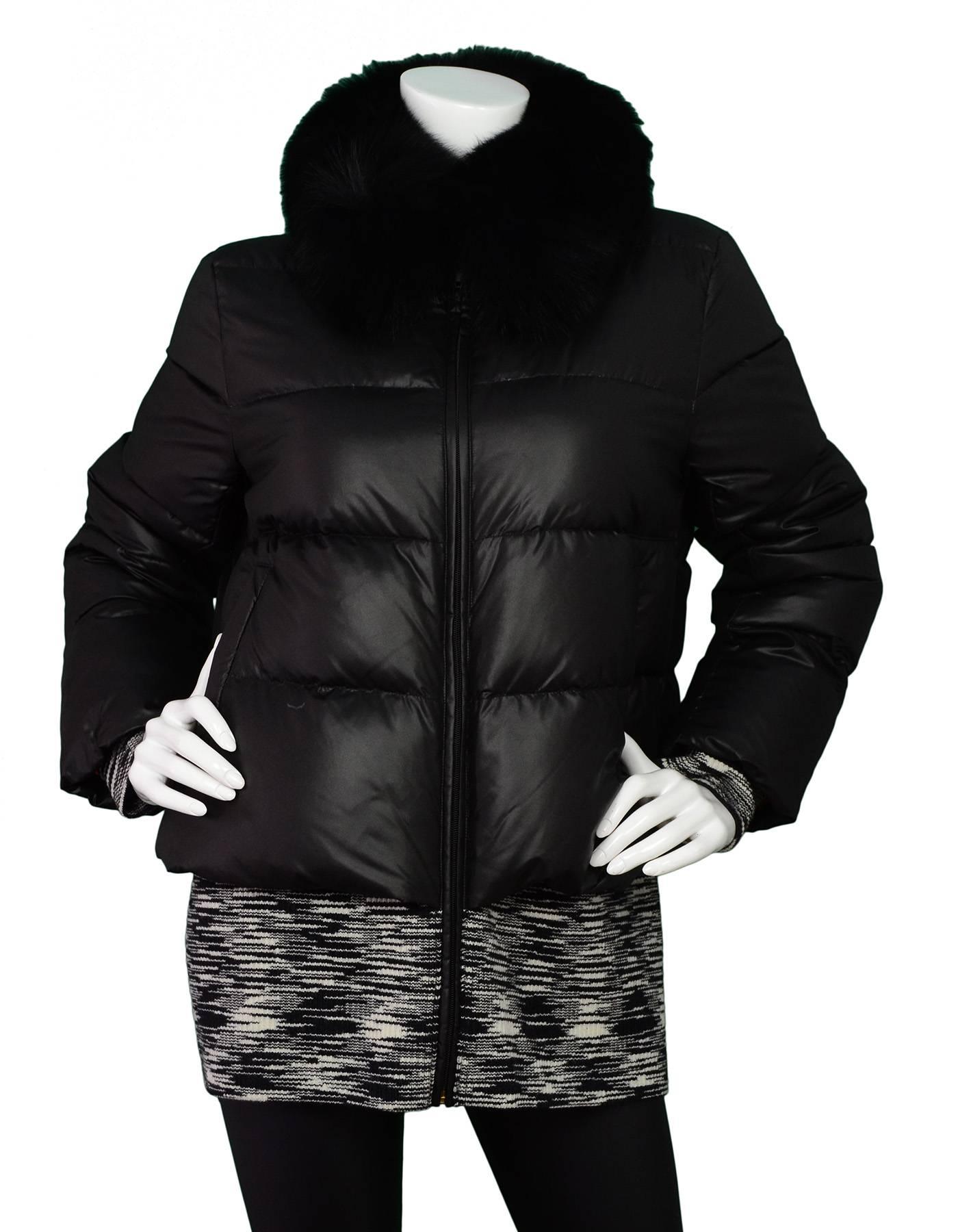 M Missoni Black Puffer Jacket with Fur Collar Sz IT46

Features knit hem

Made In: China
Color: Black
Composition: 100% Polyester
Lining: Multicolor print nylon
Closure/Opening: Zip up front
Exterior Pockets: Side hip pockets
Overall Condition: