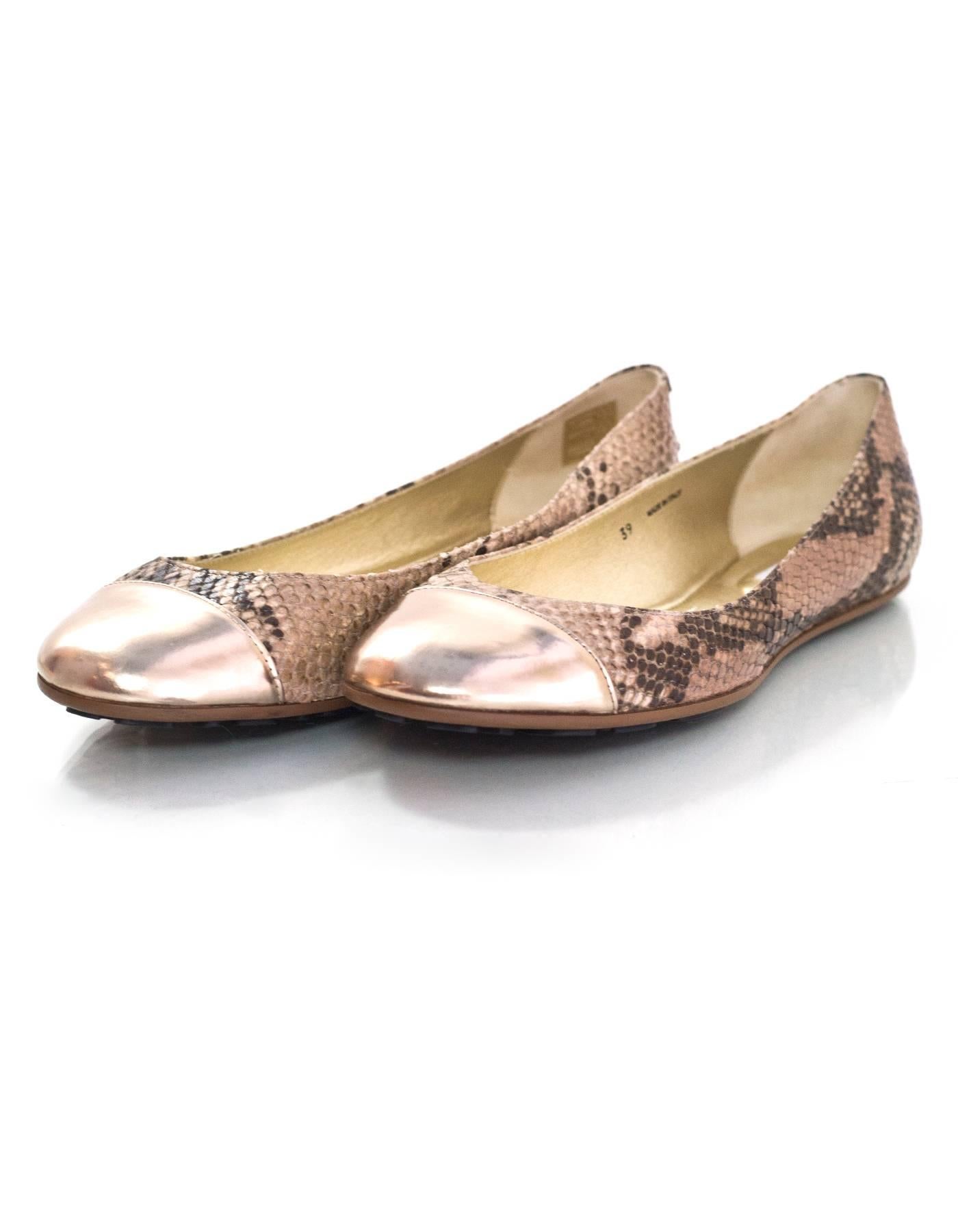 Jimmy Choo Tan Snakeskin Whirl Flats Sz 39 NEW

Made In: Italy
Color: Tan, gold
Materials: Embossed leather
Closure/Opening: Slide on
Sole Stamp: Jimmy Choo London Made in Italy 39
Overall Condition: Excellent pre-owned condition - new
Included: