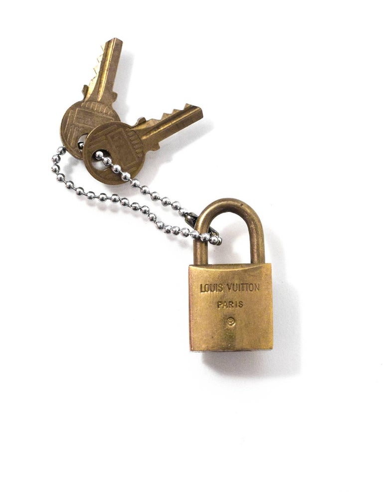 Louis Vuitton Vintage Brass Logo Lock and Keys at 1stdibs