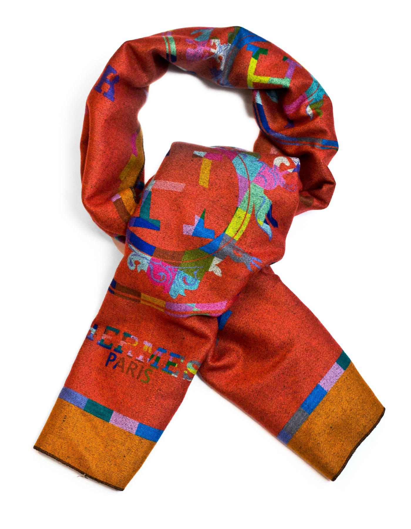 Hermes H Print Scarf
Features multicolor H print on one side, and solid black on reverse.

Color: Rust, black, multi colored
Composition: Not listed, feels like cashmere blend
Overall Condition: Excellent pre-owned condition, slight pulling at