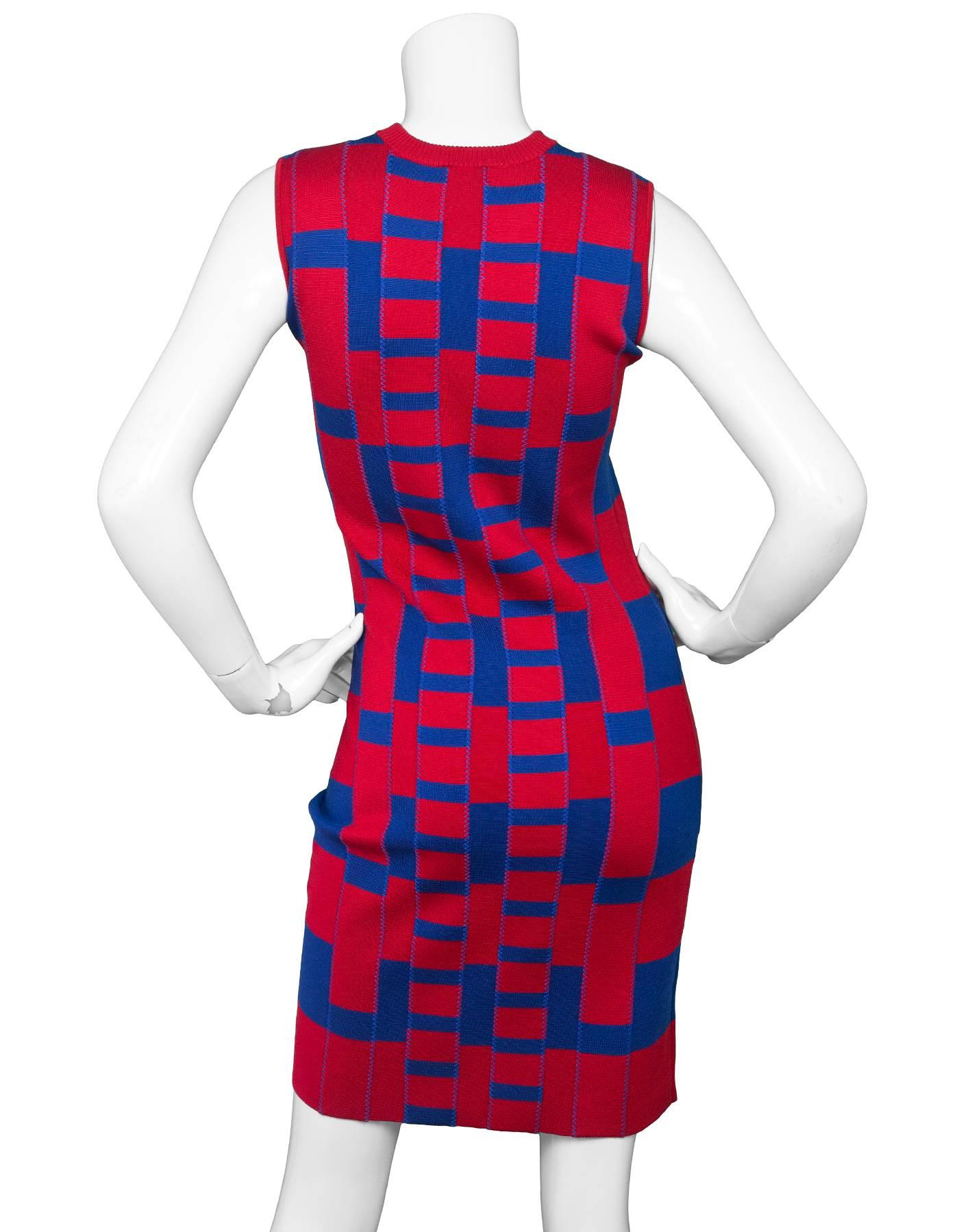 Kenzo Red & Blue Bandage Dress 
Features green leather tassel zipper pulls at each shoulder

Made In: China
Color: Red and blue
Composition: 75% silk, 25% elastane
Lining: None
Closure/Opening: Zippers at top shoulders and pull over style