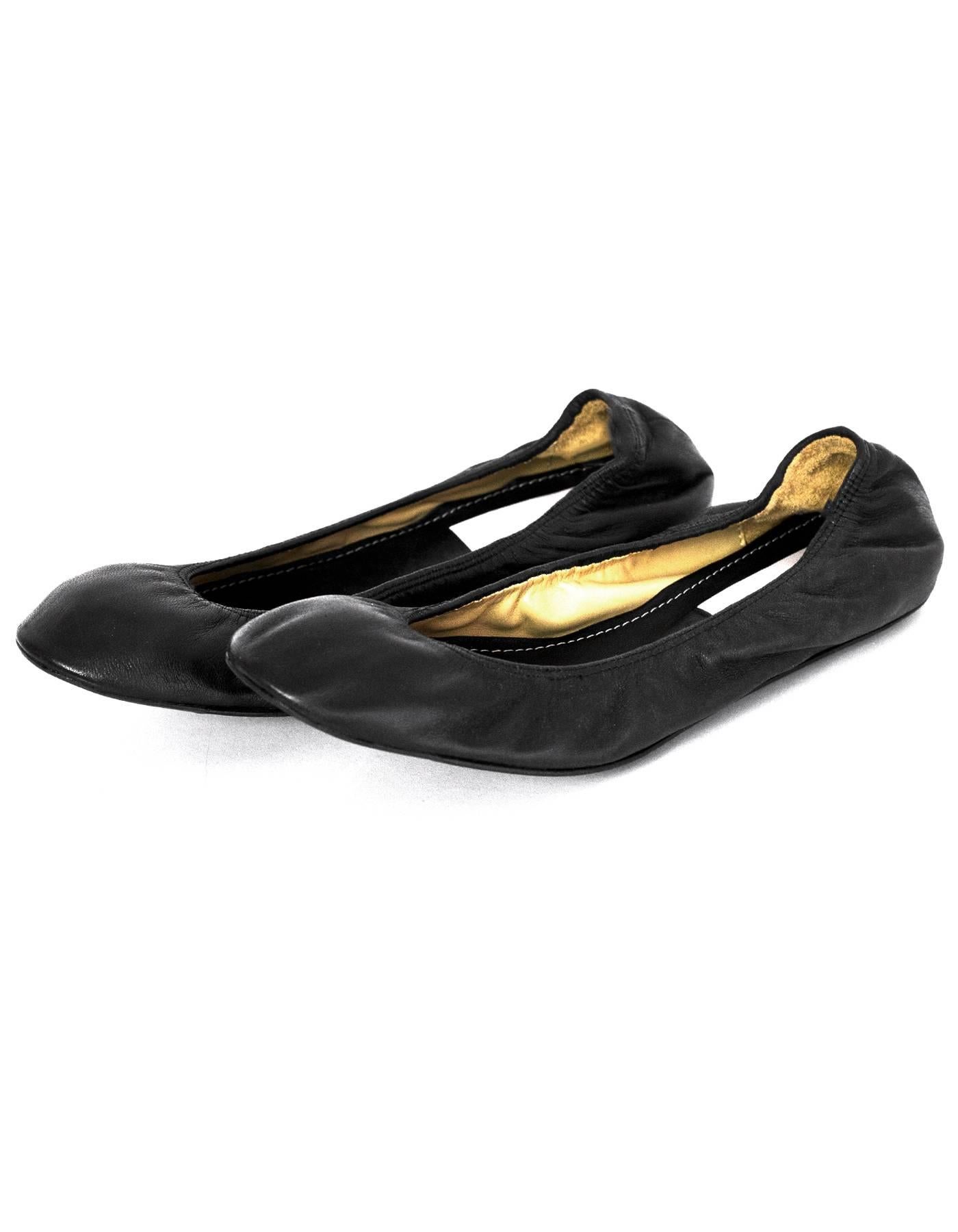 Lanvin Black Leather Stretch Flats Sz 39 NIB

Color: Black
Materials: Leather
Closure/Opening: Slide on
Sole Stamp: Lanvin 39
Overall Condition: Excellent pre-owned - NIB
Includes: Lanvin box
Marked Size: 39
Heel Height: .25