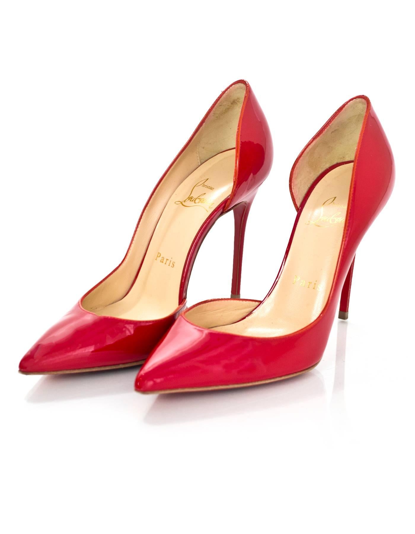 Christian Louboutin Red Patent Iriza d'Orsay Pumps Sz 36

Made In: Italy
Color: Red
Materials: Patent leather
Closure/Opening: Slide on
Sole Stamp: Christian Louboutin Made in Italy 36
Overall Condition: Excellent pre-owned condition with the