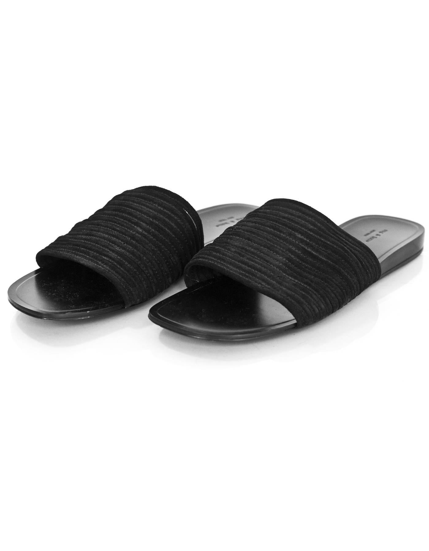 Rag & Bone Black Suede Cameron Slide Sandals Sz 39.5

Made In: China
Color: Black
Materials: Suede
Closure/Opening: Slide on
Sole Stamp: Rag & Bone New York 39.5
Retail Price: $295 + tax
Overall Condition: Excellent pre-owned condition with