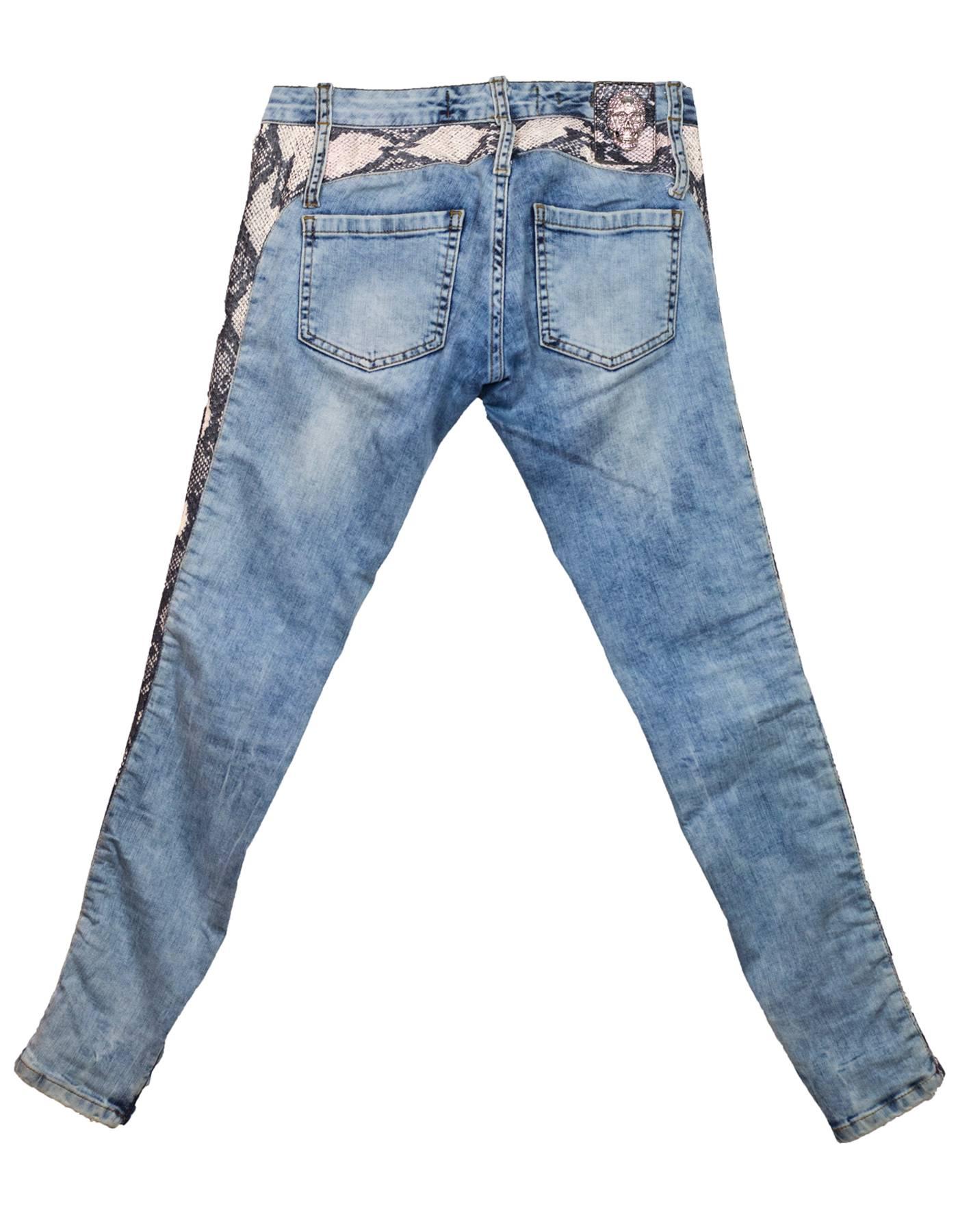 Philipp Plein Snakeskin Jeans Sz 25
Features pink snakeskin print down legs, zippers at ankles

Made In: Turkey
Color: Blue, pink
Closure/Opening: Zip and button closure
Composition: Cotton blend
Exterior Pockets: Hip pockets and coin