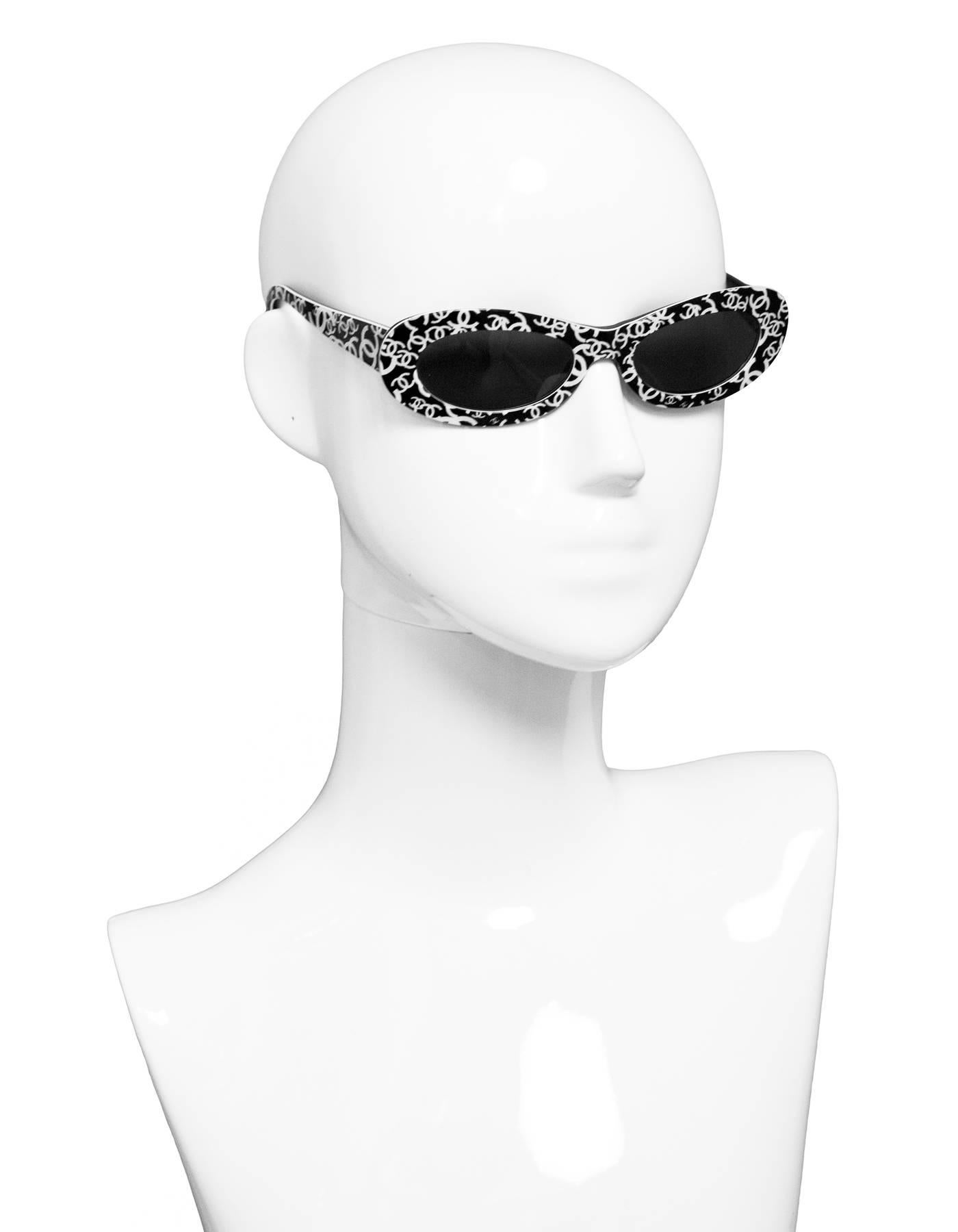 Chanel Vintage Black and Ivory CC Sunglasses

Made In: Italy
Color: Black and ivory
Materials: Resin
Overall Condition: Very good pre-owned vintage condition with the exception of surface marks, misaligned hinges

Measurements: 
Length Across: