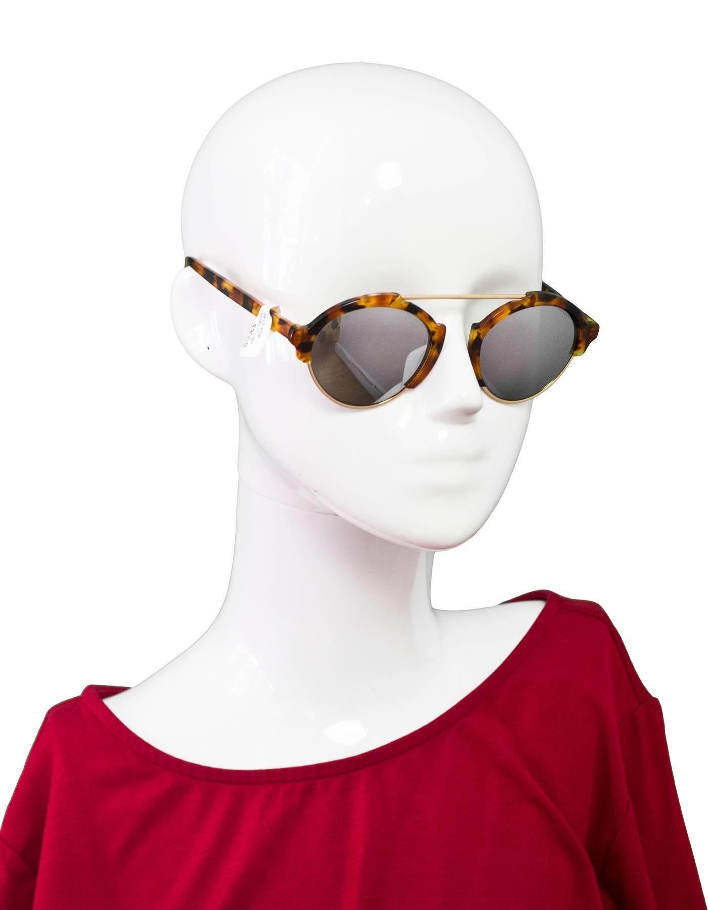 Illesteva Tortoise Mirrored Milan III Sunglasses

Made In: Italy
Color: Brown/tortoise
Materials: Resin, metal
Retail Price: $300 + tax
Overall Condition: Excellent pre-owned condition
Includes: Illesteva box and case

Measurements: 
Length Across: