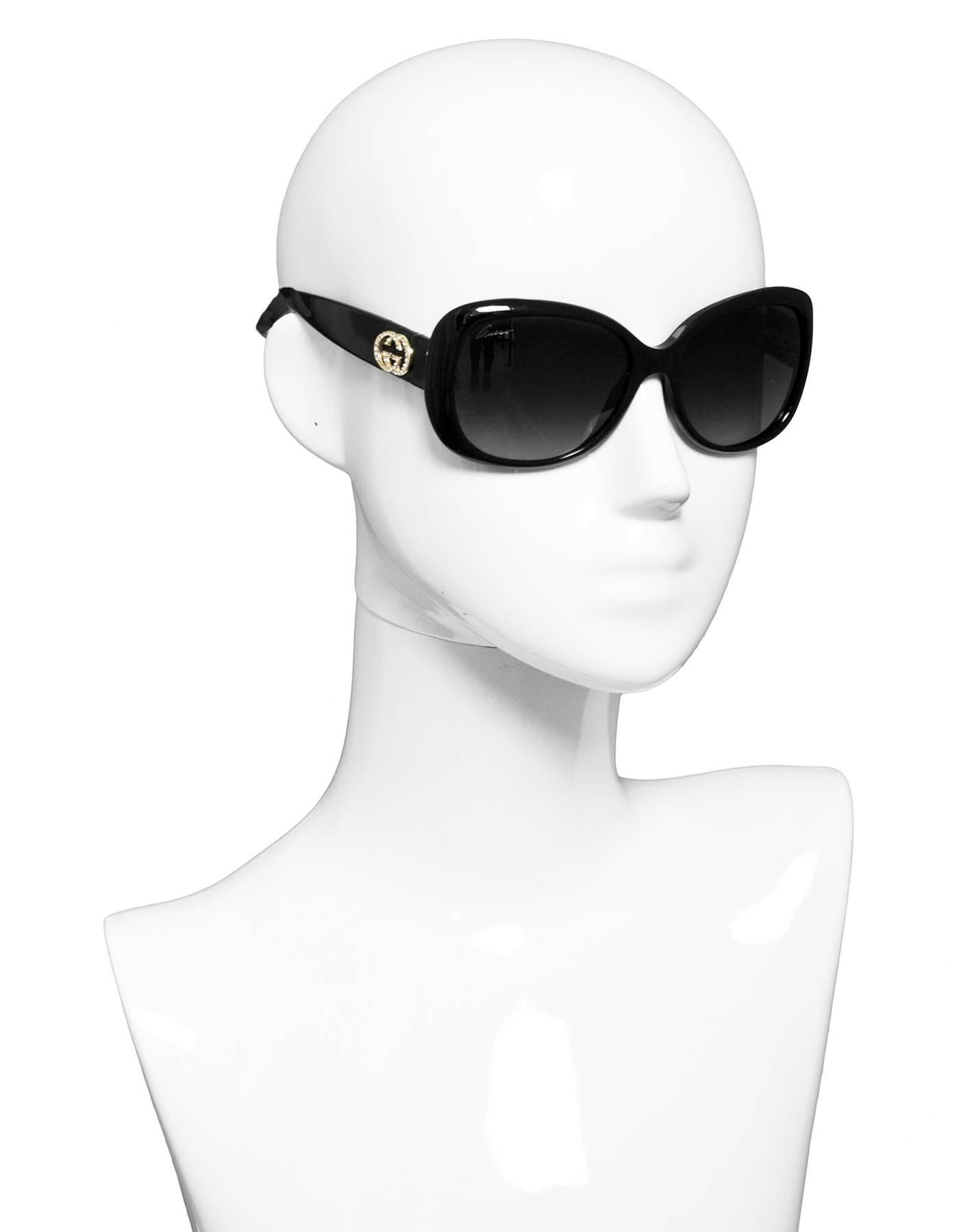 Gucci Black GG Crystal Sunglasses

Made In: Italy
Color: Black, gold
Materials: Resin, metal, crystal
Retail Price: $395 + tax
Overall Condition: Very good pre-owned condition with the exception of light surface marks throughout and loose GG logo at