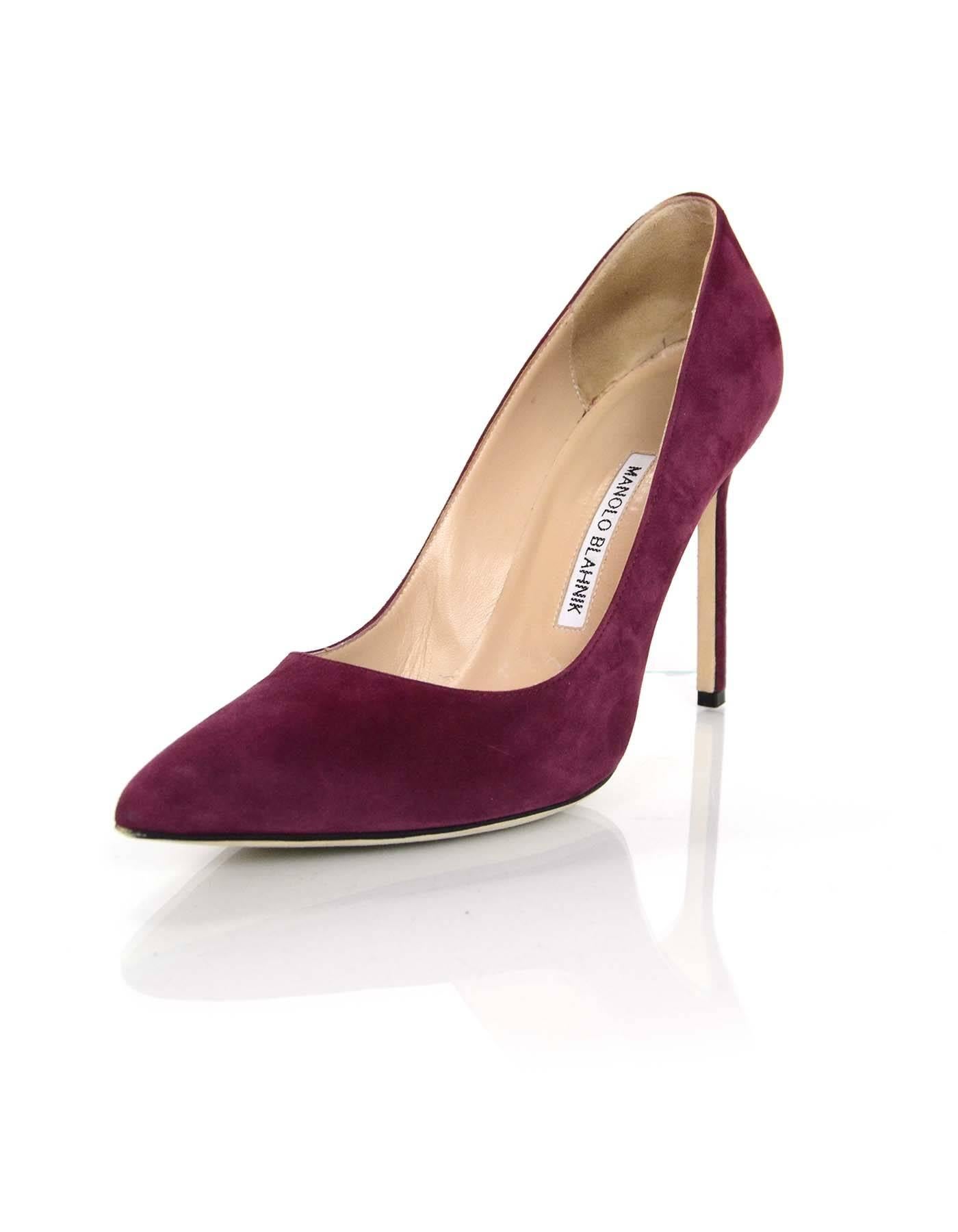 Manolo Blahnik Burgundy Suede BB Pumps Sz 38

Made In: Italy
Color: Burgundy
Materials: Suede
Closure/Opening: Slide on
Sole Stamp: Manolo Blahnik Made in Italy 38
Retail Price: $595 + tax
Overall Condition: Excellent pre-owned condition with the