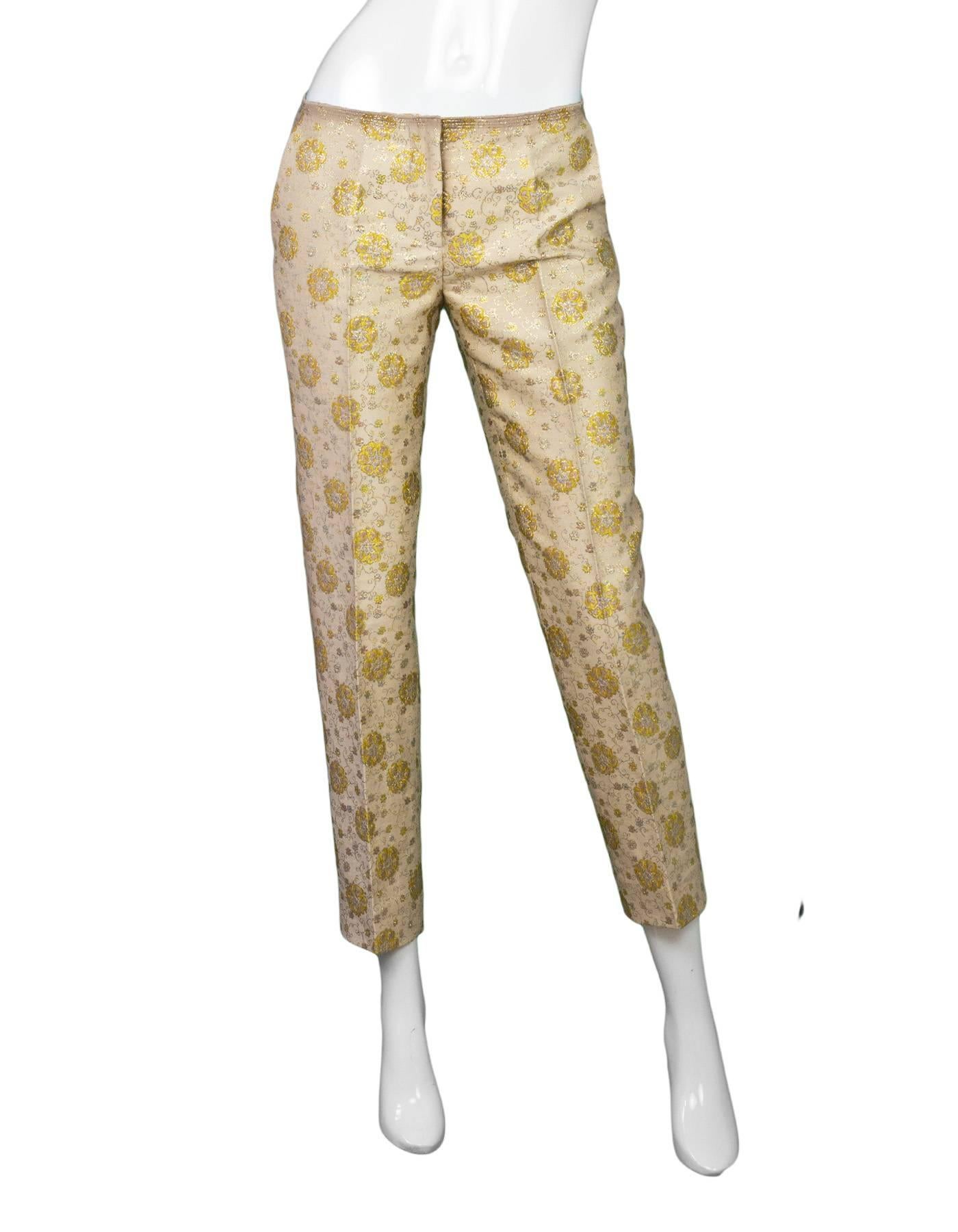 Prada Champagne & Gold Brocade Pants

Made In: Italy
Color: Champagne, gold, pink, and yellow
Composition: 31% cotton, 24% acrylic, 17% silk, 15% acetate, 7% metal fibers, 6% nylon
Lining: Champagne, silk-blend
Closure/Opening: Front zip and