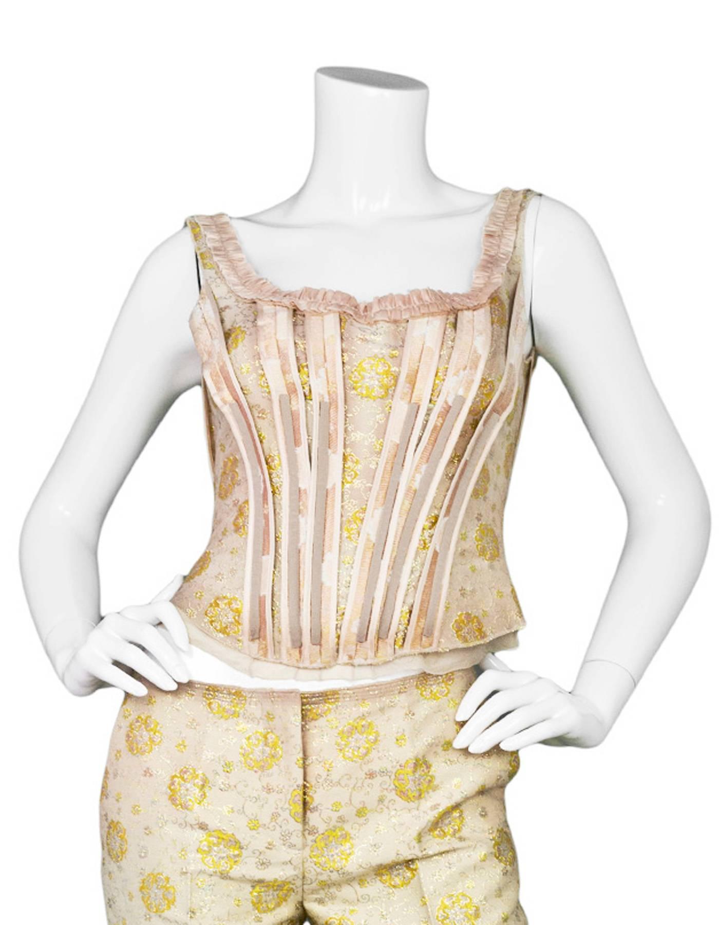 Prada Champagne & Gold Brocade Corset Top 

Made In: Italy
Color: Champagne, gold, pink, and yellow
Composition: 31% cotton, 24% acrylic, 17% silk, 15% acetate, 7% metal fibers, 6% nylon
Lining: Champagne, 55% silk, 45%