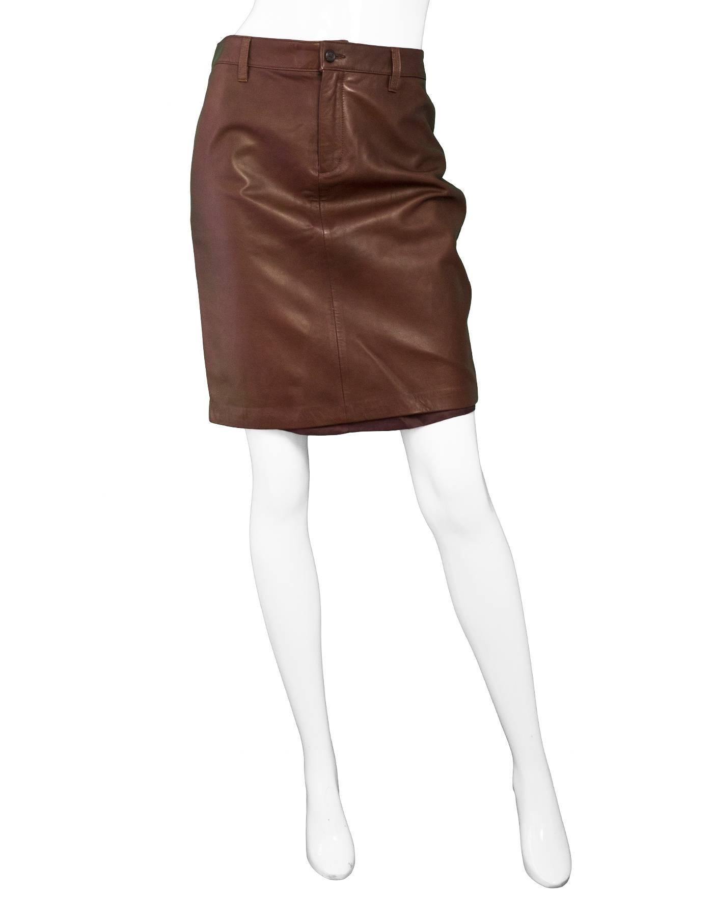 Ralph Lauren Brown Leather Skirt Sz 6 NWT

Made in: China
Color: Brown
Composition: 100% Leather
Lining: Brown viscose
Closure/opening: Front button and zip closure
Exterior Pockets: Back slit pockets
Interior Pockets: None
Retail Price: $500 +