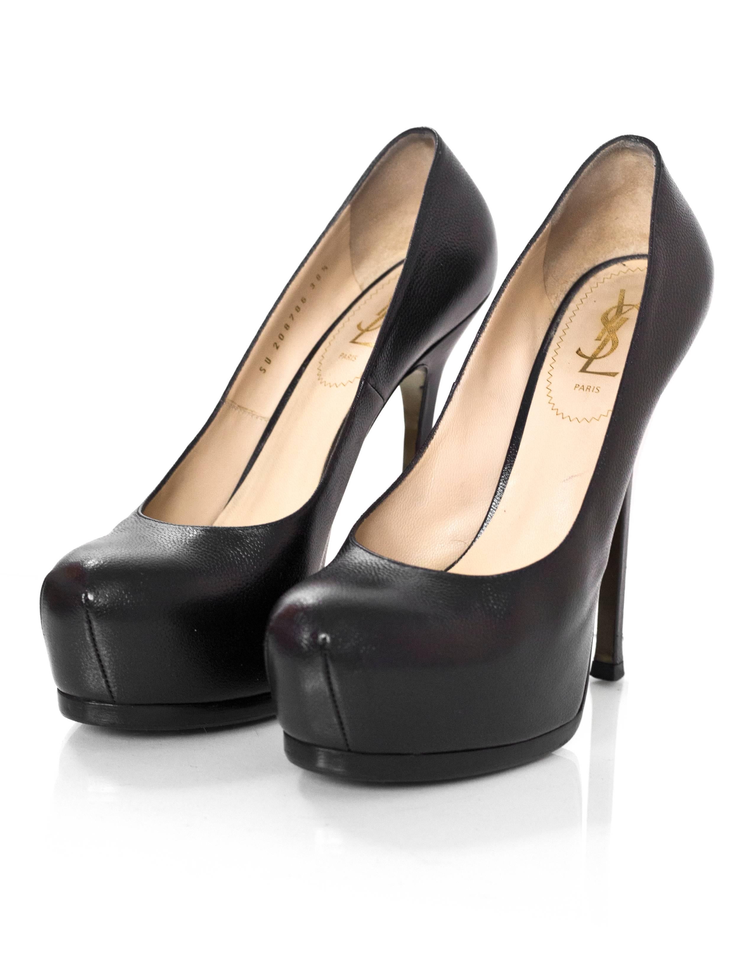 YSL Black Tribtoo Pumps Sz 38.5

Made In: Italy
Color: Black
Materials: Leather
Closure/Opening: Slip on
Sole Stamp: Yves Saint Laurent Made in Italy 38.5
Retail Price: $795 + tax
Overall Condition: Excellent pre-owned condition with the exception