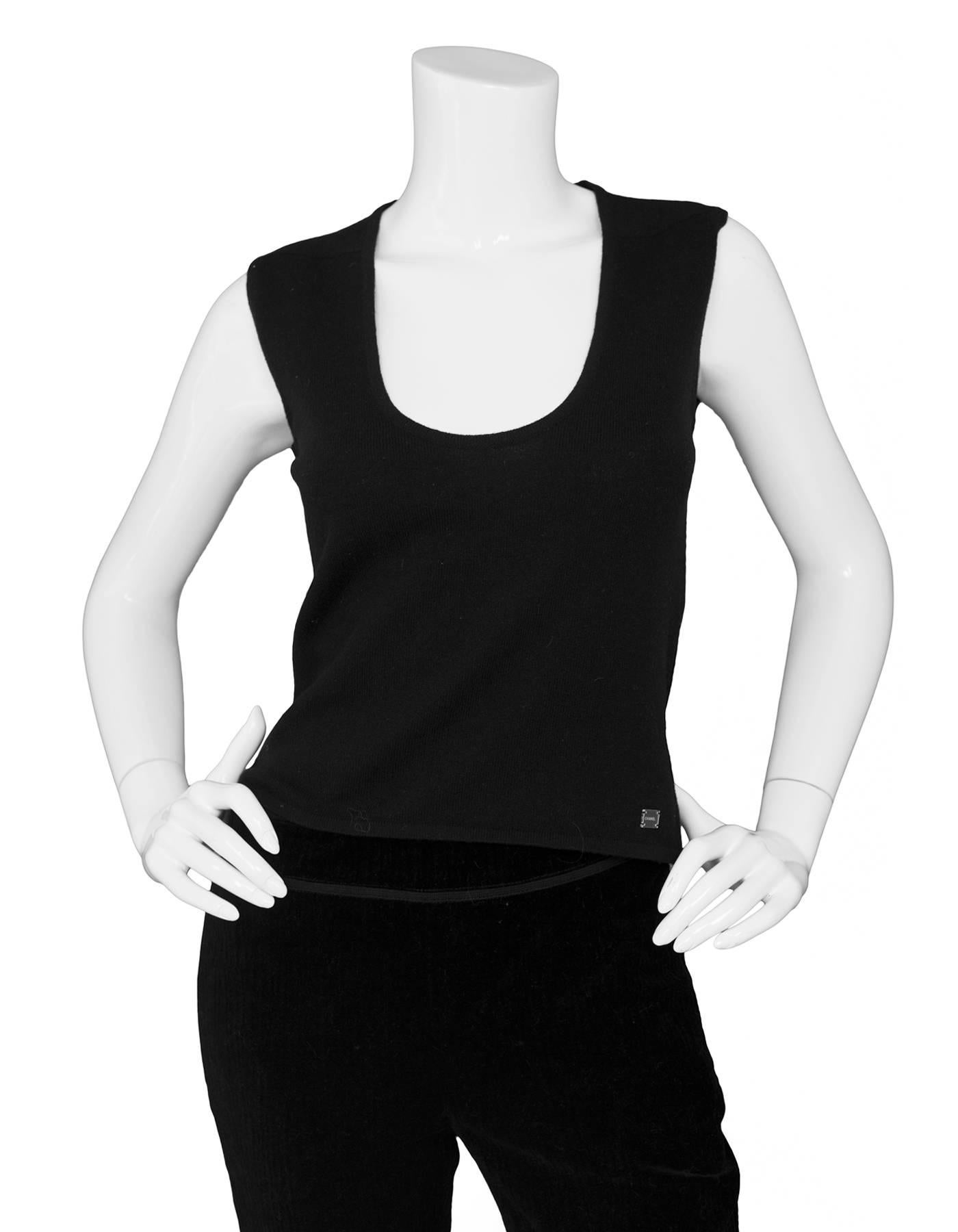 Chanel Black Cashmere Sleeveless Top Sz FR38

Made In: United Kingdom
Year of Production: 2005
Color: Black
Composition: 100% cashmere
Closure/Opening: Pull over 
Overall Condition: Excellent pre-owned condition, light pilling
Marked Size: FR38/ US