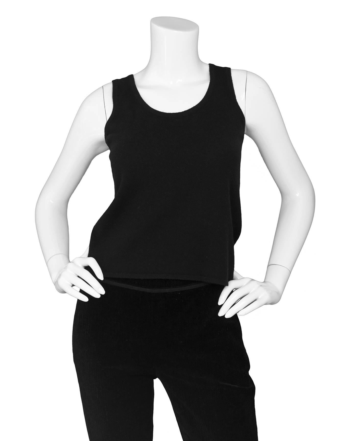 Chanel Black Cashmere Sleeveless Top Sz FR38

Made In: United Kingdom
Color: Black
Composition: 100% cashmere
Closure/Opening: Pull over 
Overall Condition: Excellent pre-owned condition, light pilling
Marked Size: FR38/ US 4, 6
Bust: 29