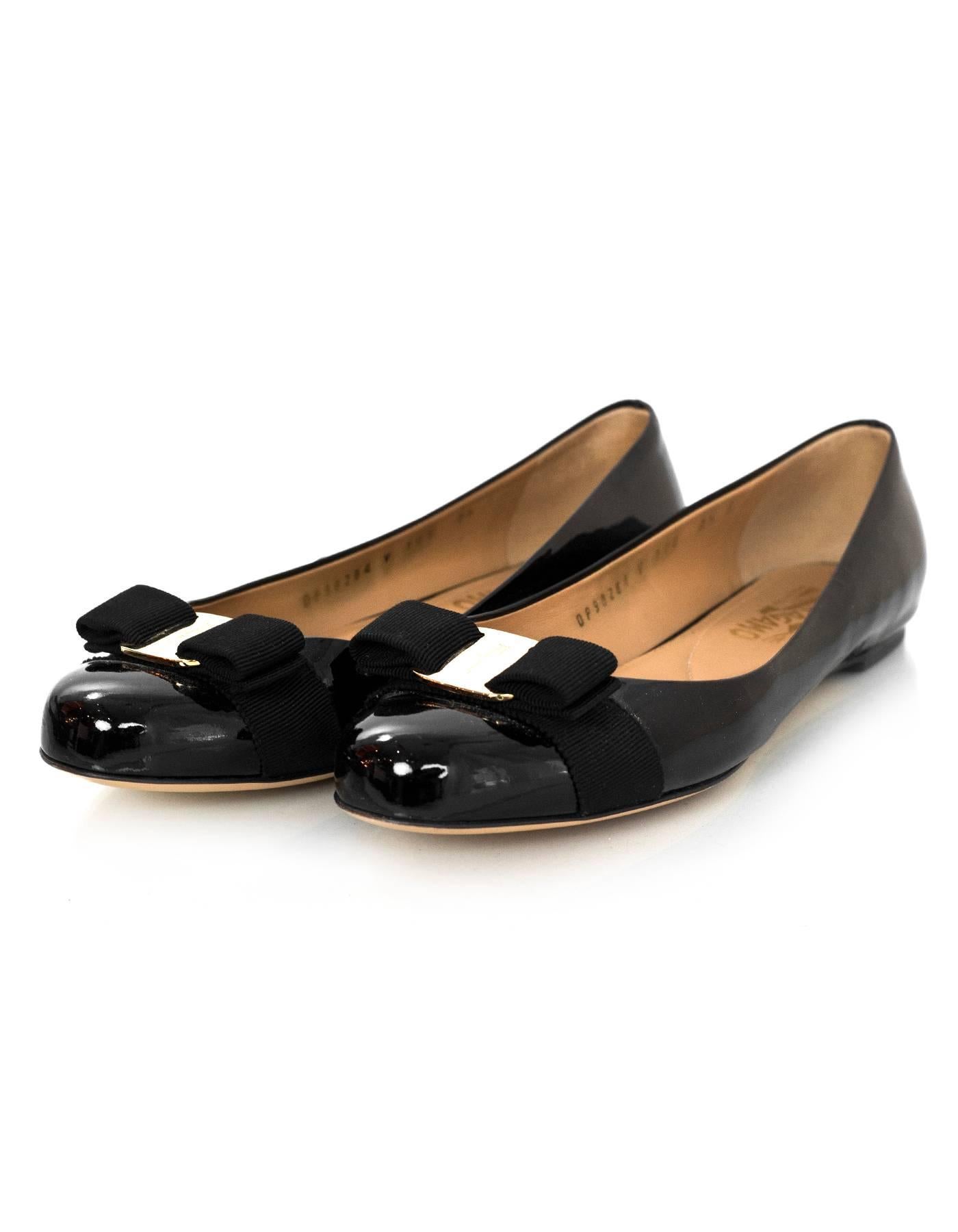 Salvatore Ferragamo Black Patent Leather Varina Bow Flats Sz 7.5C

*This shoe runs wide*

Made In: Italy
Color: Black
Materials: Patent leather
Closure/Opening: Slide on
Sole Stamp: Salvatore Ferragamo Made in Italy
Retail Price: $550 + tax
Overall