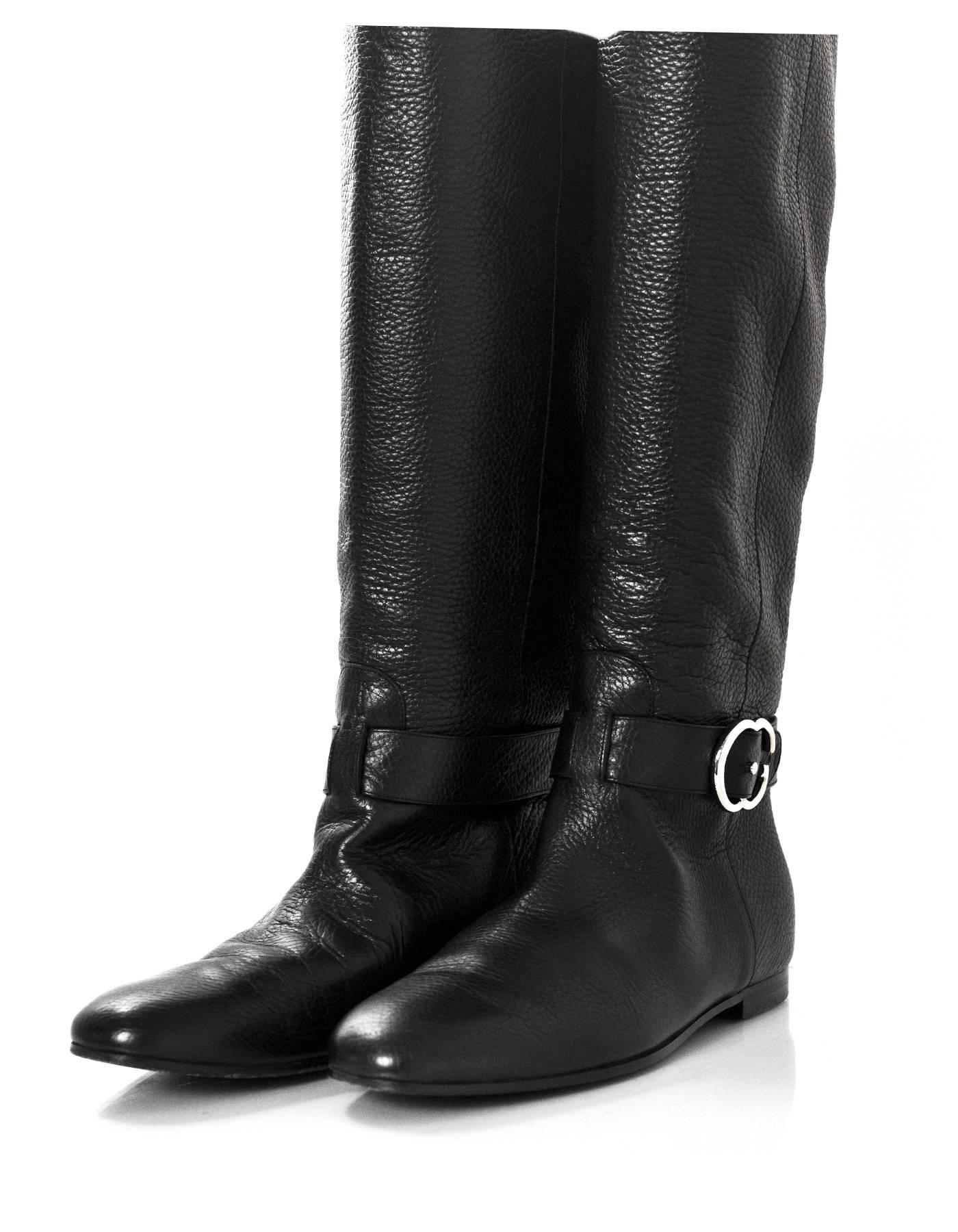 Gucci Black Pebbled Leather Boots Sz 37.5

Features logo buckle at ankles

Made In: Italy
Color: Black
Materials: Leather
Closure/Opening: Pull on
Sole Stamp: Gucci Made in Italy 37.5
Overall Condition: Excellent pre-owned condition with the