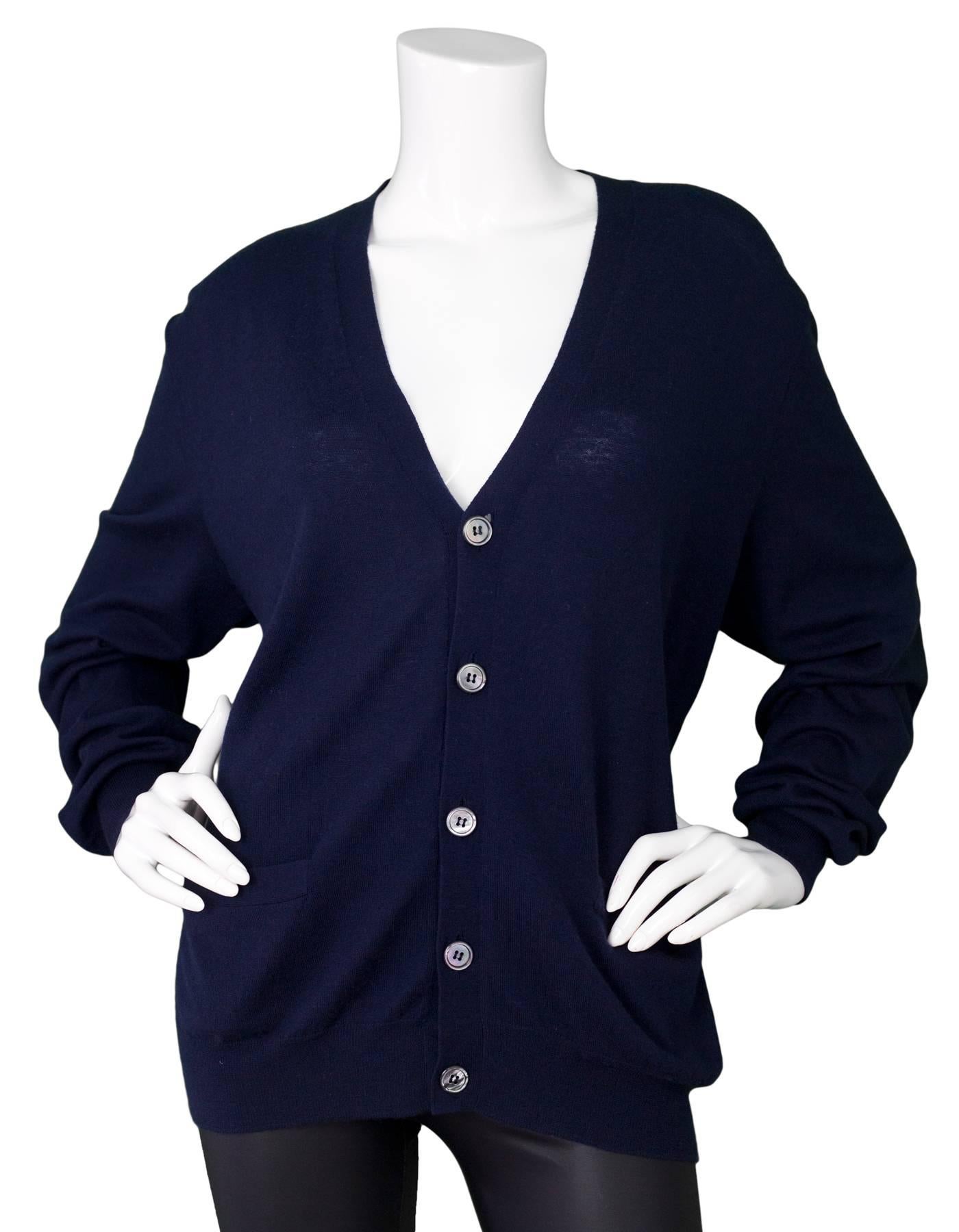 Ralph Lauren Purple Label Navy Cashmere Cardigan Sz XL

Made In: Italy
Color: Navy
Composition: 100% Cashmere
Lining: None
Closure/Opening: Front button closure
Exterior Pockets: Slit pockets
Overall Condition: Excellent pre-owned condition with the