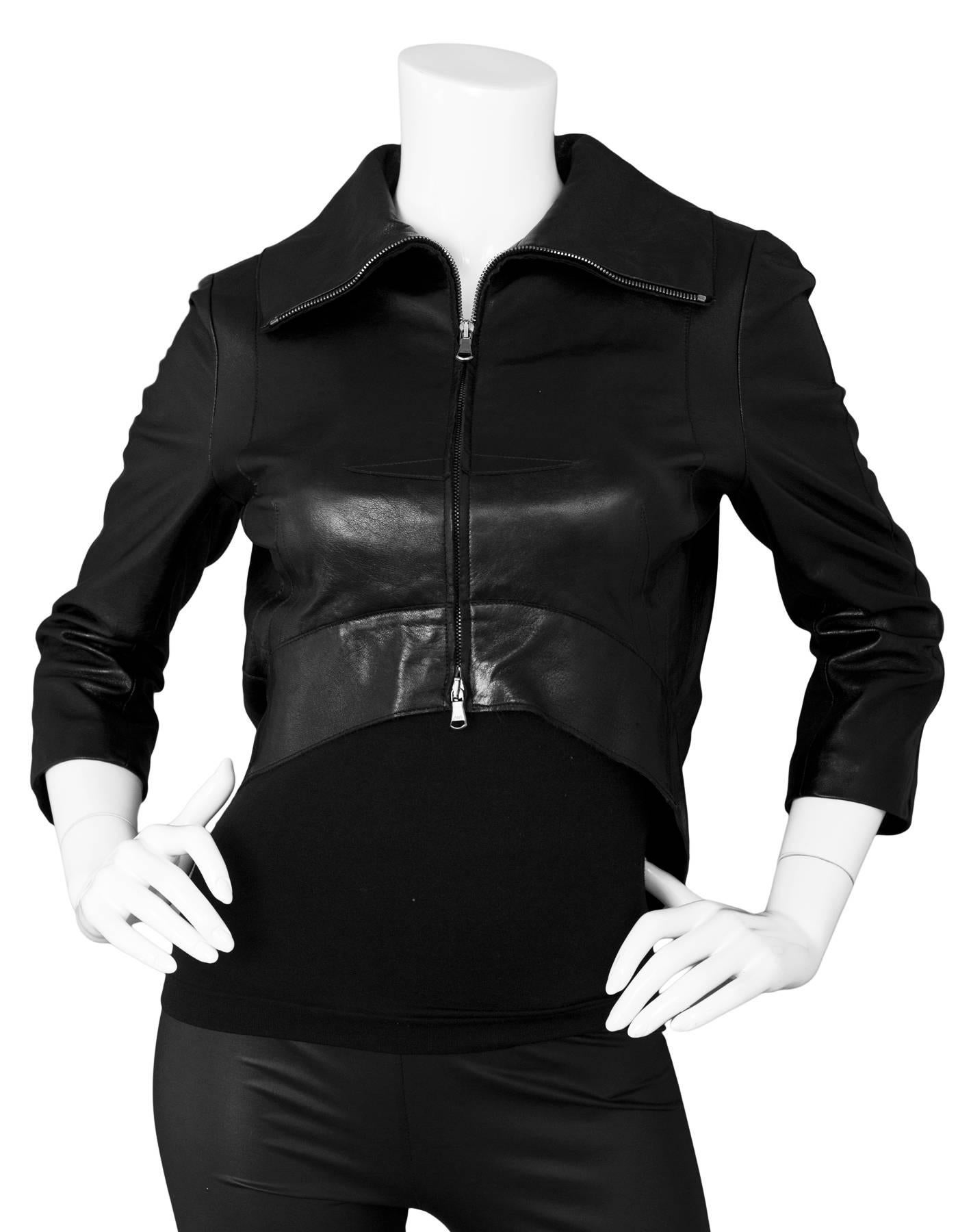 Kaufmanfranco Black Leather High-Low Jacket Sz 2

Made In: USA
Color: Black
Composition: 100% Leather
Lining: Black mesh textile
Closure/Opening: Front double zip closure
Overall Condition: Excellent pre-owned condition
Marked Size: US 2
Shoulders: