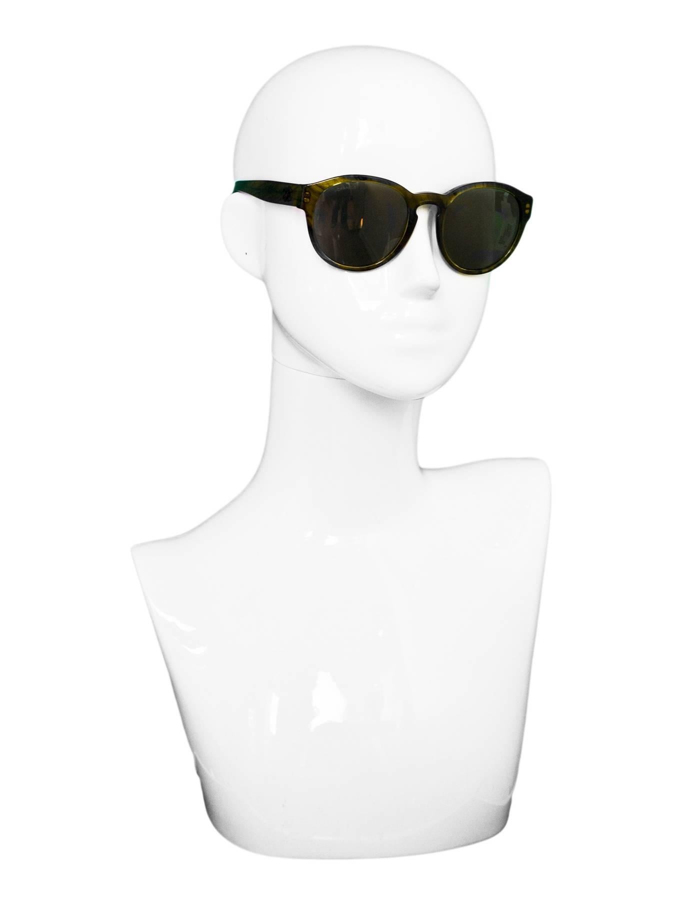 Chanel Green 5359 Pantos Fall Round Frame Sunglasses

Made In: Italy
Color: Green
Materials: Resin
Retail Price: $405 + tax
Overall Condition: Excellent pre-owned condition
Included: Chanel box, case, dust bag, sales tag

Measurements: 
Across: