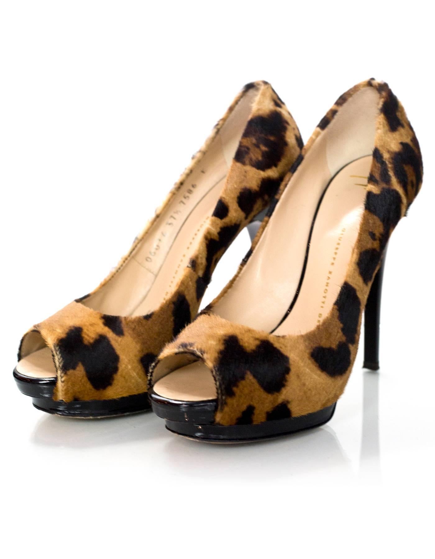 Giuseppe Zanotti Leopard Print Ponyhair Open-toe Pumps Sz 37.5

Made In: Italy
Color: Tan, brown
Materials: Ponyhair
Closure/Opening: Slide on
Sole Stamp: Vero Cuoio Made in Italy 37.5
Overall Condition: Very good pre-owned condition with the