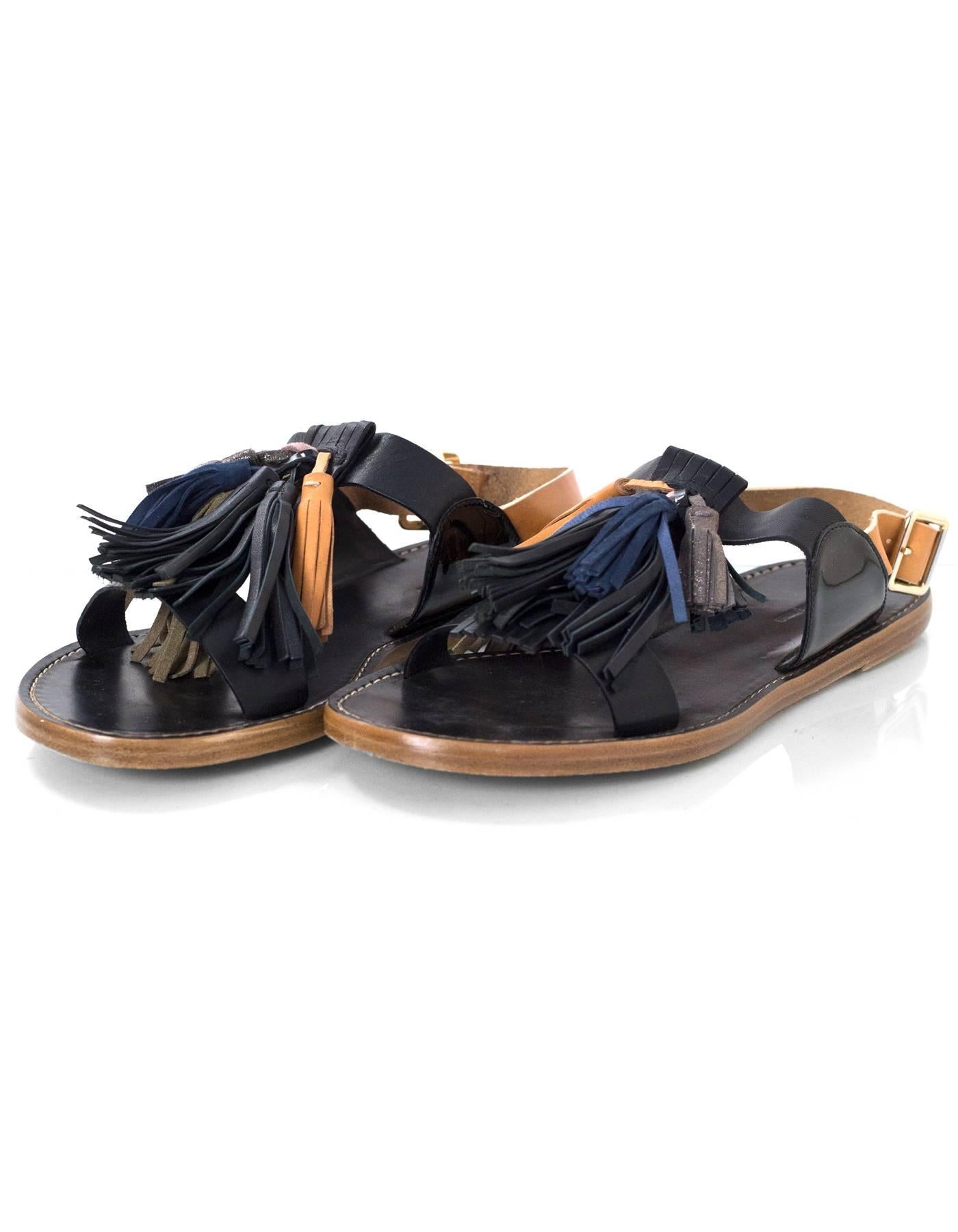 Etoile Isabel Marant Black & Multi Color Pompons Tassel Sandals Sz 41

Made In: Italy
Color: Black, multi
Materials: Leather
Closure/Opening: Buckle closure at heel
Sole Stamp: Isabel Marant Etoile Made in Italy 41
Retail Price: $905+ tax
Overall