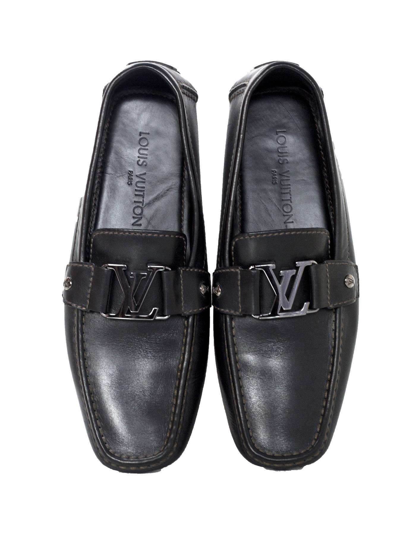 Louis Vuitton Men's Black Leather Monte Carlo Loafers Sz 7.5

Made In: Italy
Color: Black
Materials: Leather
Closure/Opening: Slide on
Sole Stamp: Louis Vuitton Paris
Retail Price: $660 + tax
Overall Condition: Excellent pre-owned condition with the