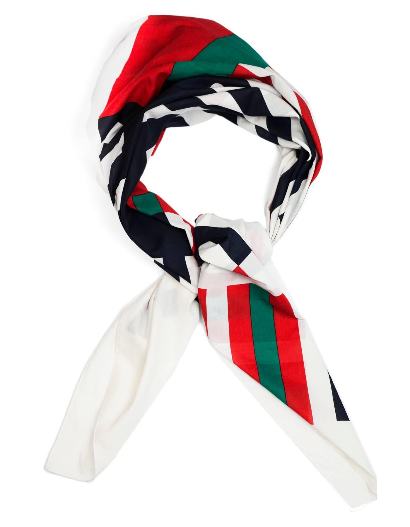 Chanel Red, White & Navy CC Scarf/Wrap

Made In: Italy
Color: Red, white, navy
Composition: Not listed, feels like cotton
Overall Condition: Excellent pre-owned condition with the exception of some light marks/stains

Measurements:
Length: