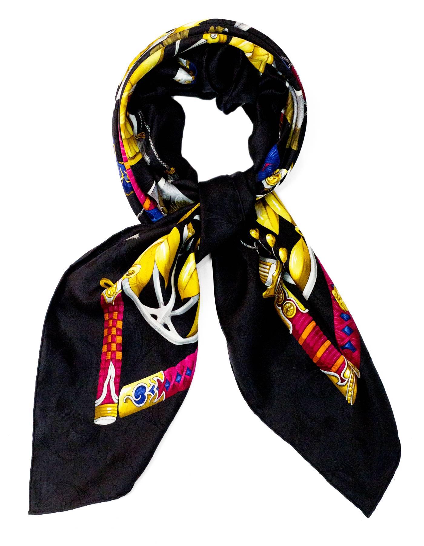 Hermes Black & Gold Princes du Soleil Levant Silk 90cm Scarf

Made In: France
Color: Black, gold
Composition: 100% Silk
Retail Price: $395 + tax
Overall Condition: Excellent pre-owned vintage condition

Measurements:
Length: 35"
Width:
