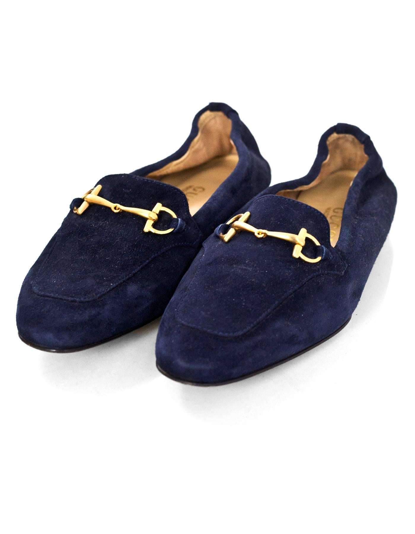 Gucci Navy Suede Horsebit Loafers Sz 37C NEW

This is a wide fit shoe

Made In: Italy
Color: Navy
Materials: Suede
Closure/Opening: Slide on with stretch elastic at heel
Sole Stamp: Gucci Made in Italy C 37
Overall Condition: Excellent pre-owned
