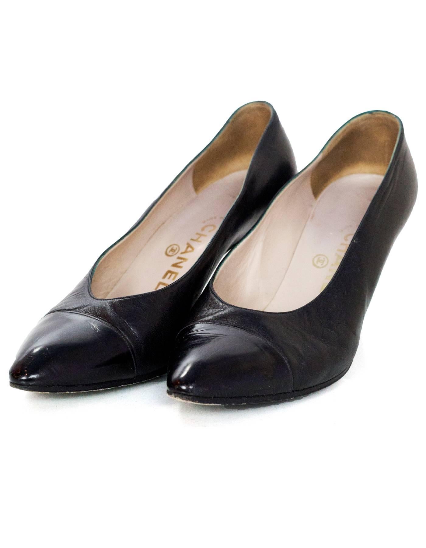 Chanel Black Leather Cap-Toe Pumps Sz 37.5

Made In: Italy
Color: Black
Materials: Leather
Closure/Opening: Slide on
Sole Stamp: CC Made in Italy 37 1/2
Overall Condition: Very good pre-owned condition with the exception oflight wear at insoles and