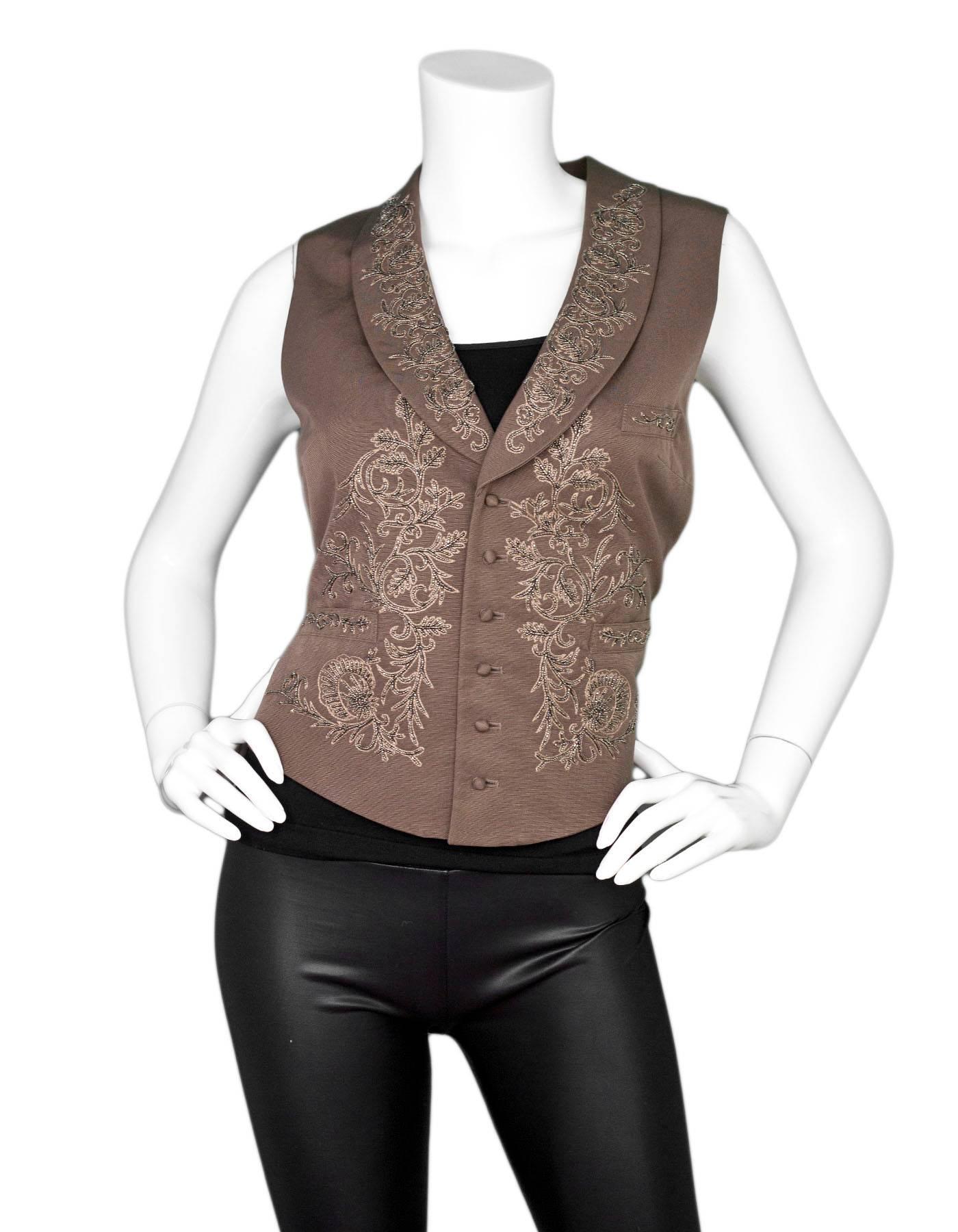 Ralph Lauren Brown Beaded Vest Sz 8

Made In: China
Color: Brown
Composition: 74% cotton, 26% silk
Lining: Brown textile
Closure/Opening: Front button closure
Exterior Pockets: Slit pockets
Overall Condition: Excellent pre-owned condition
Marked