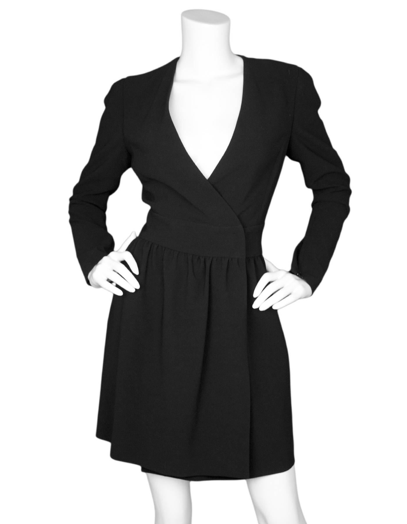 Celine Black Wrap Dress Sz FR40

Made In: France
Color: Black
Composition: 70% triacetate, 30% silk
Closure/Opening: Front hidden hook and eye and button closure at waist
Overall Condition: Excellent pre-owned condition
Marked Size: FR40/US8
Bust: