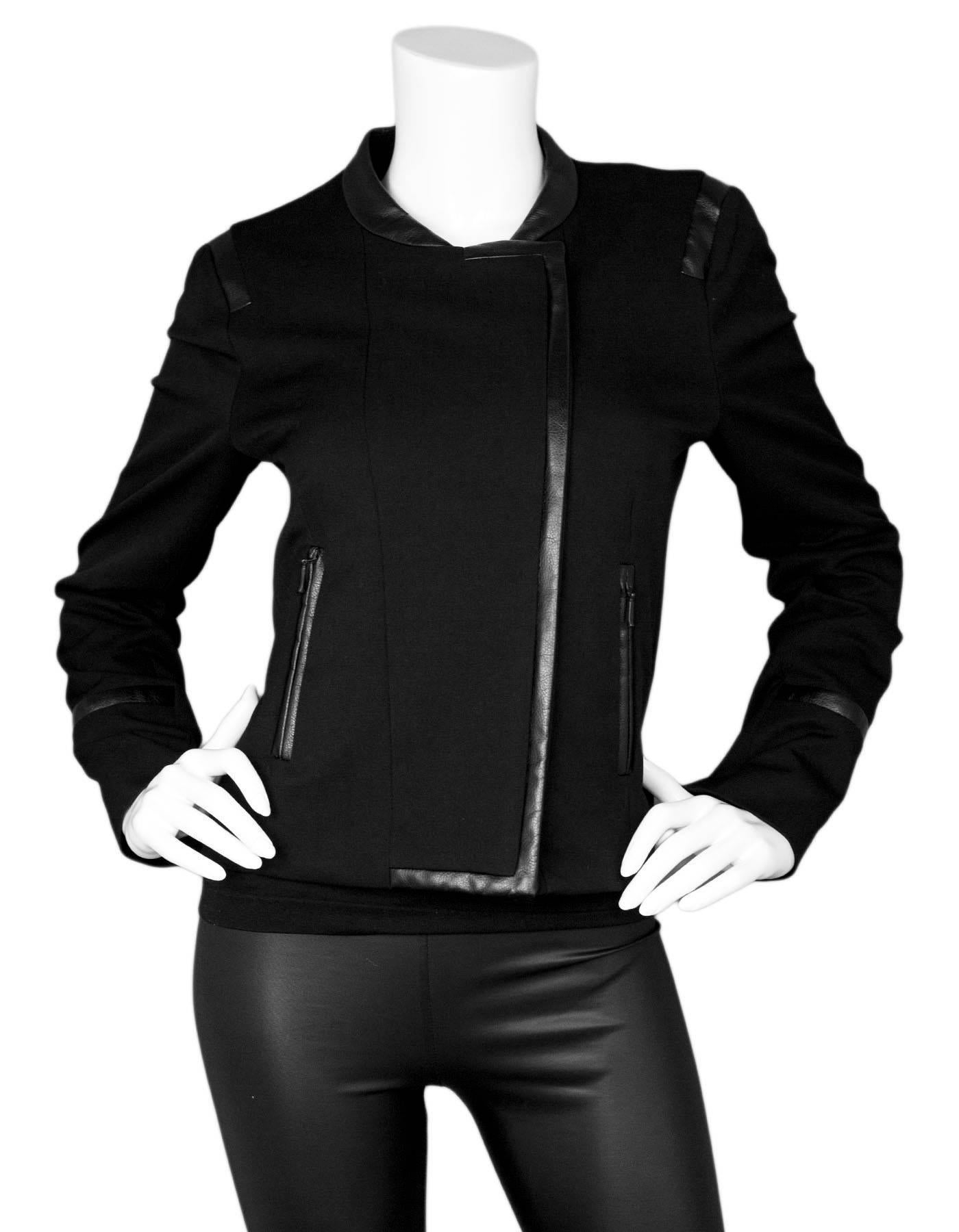 Comptoir Des Cotonniers Black Jacket with Faux Leather Trim Sz FR40

Made In: France
Color: Black
Composition: 64% Polyester, 31% viscose, 5% elastane
Lining: Black textile
Closure/Opening: Front zip closure
Overall Condition: Excellent pre-owned