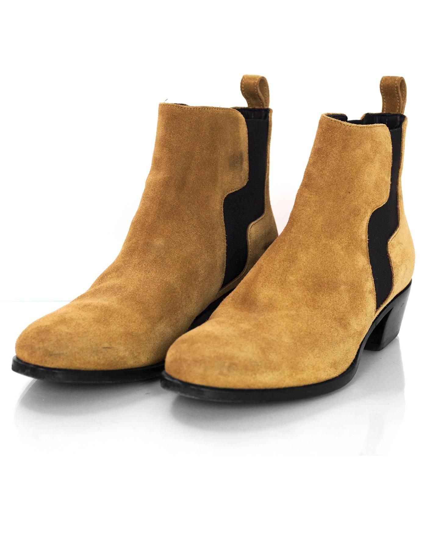 Pierre Hardy Camel Suede Gipsy Ankle Boots Sz 36

Made In: Italy
Color: Camel
Materials: Suede
Closure/Opening: Pull on, stretch sides
Sole Stamp: Pierre Hardy Made in Italy 36
Retail Price: $845 + tax
Overall Condition: Excellent pre-owned