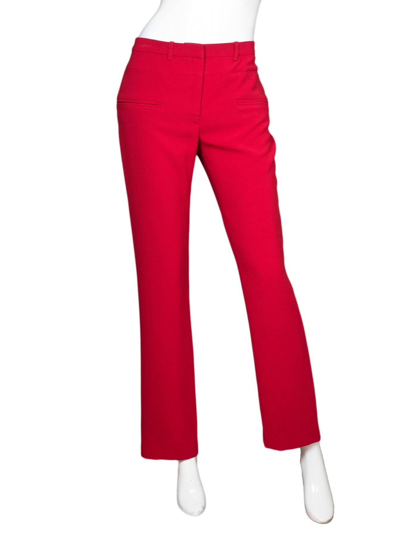 Altuzarra Red Pants Sz IT38

Made In: Italy
Color: Red
Closure/Opening: Zip fly and button closure
Exterior Pockets: Faux hip pockets
Composition: 69% Tri-acetate, 31% Polyester
Interior Pockets: None
Retail Price: $550 + tax
Overall Condition: