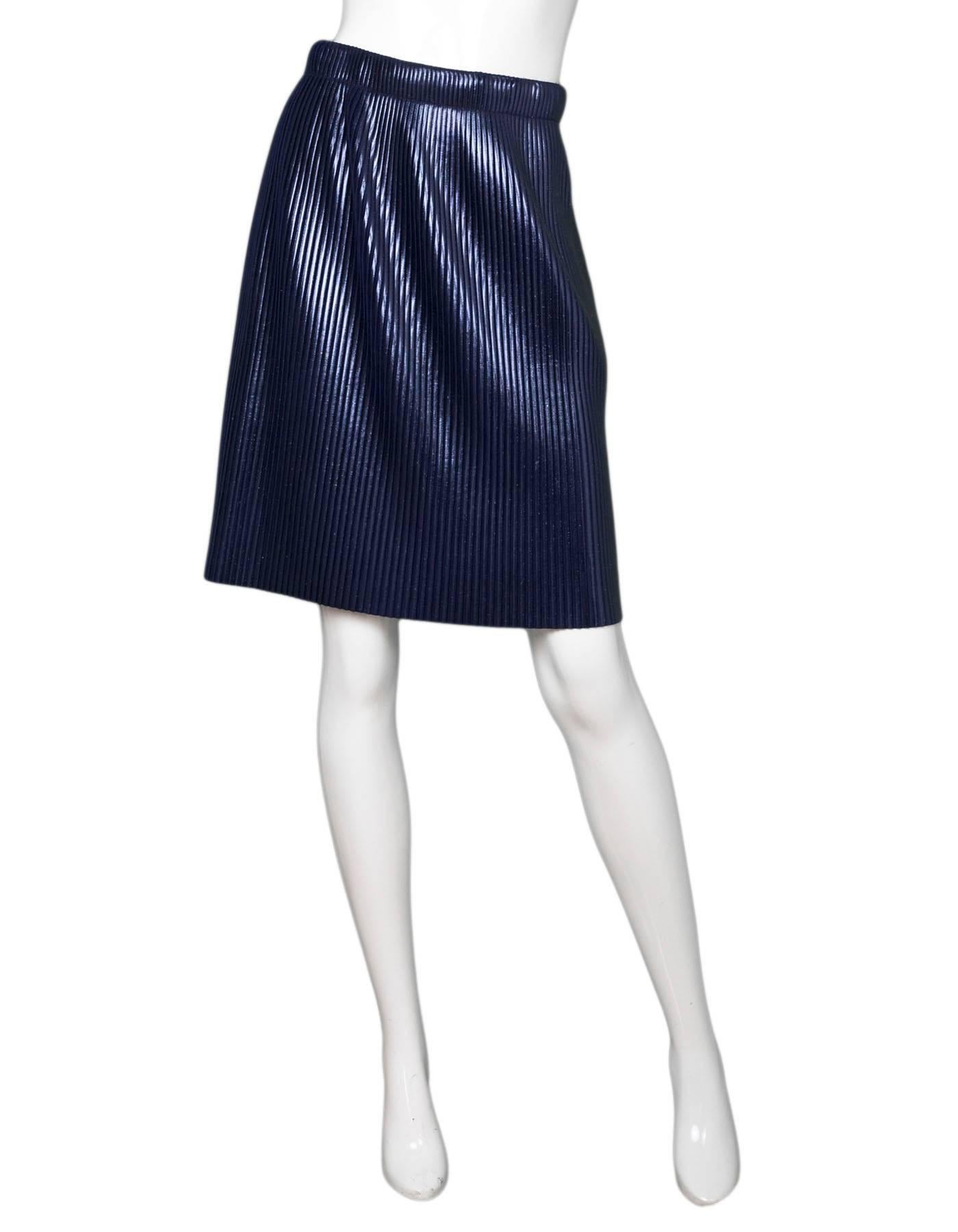Golden Goose Navy Liza Coated Plisse Skirt Sz XS

Made In: Italy
Color: Navy
Composition: 100% Polyester
Lining: None
Closure/Opening: Stretch wasitband
Retail Price: $500 + tax
Overall Condition: Excellentpre-owned condition
Marked Size: XS
Waist:
