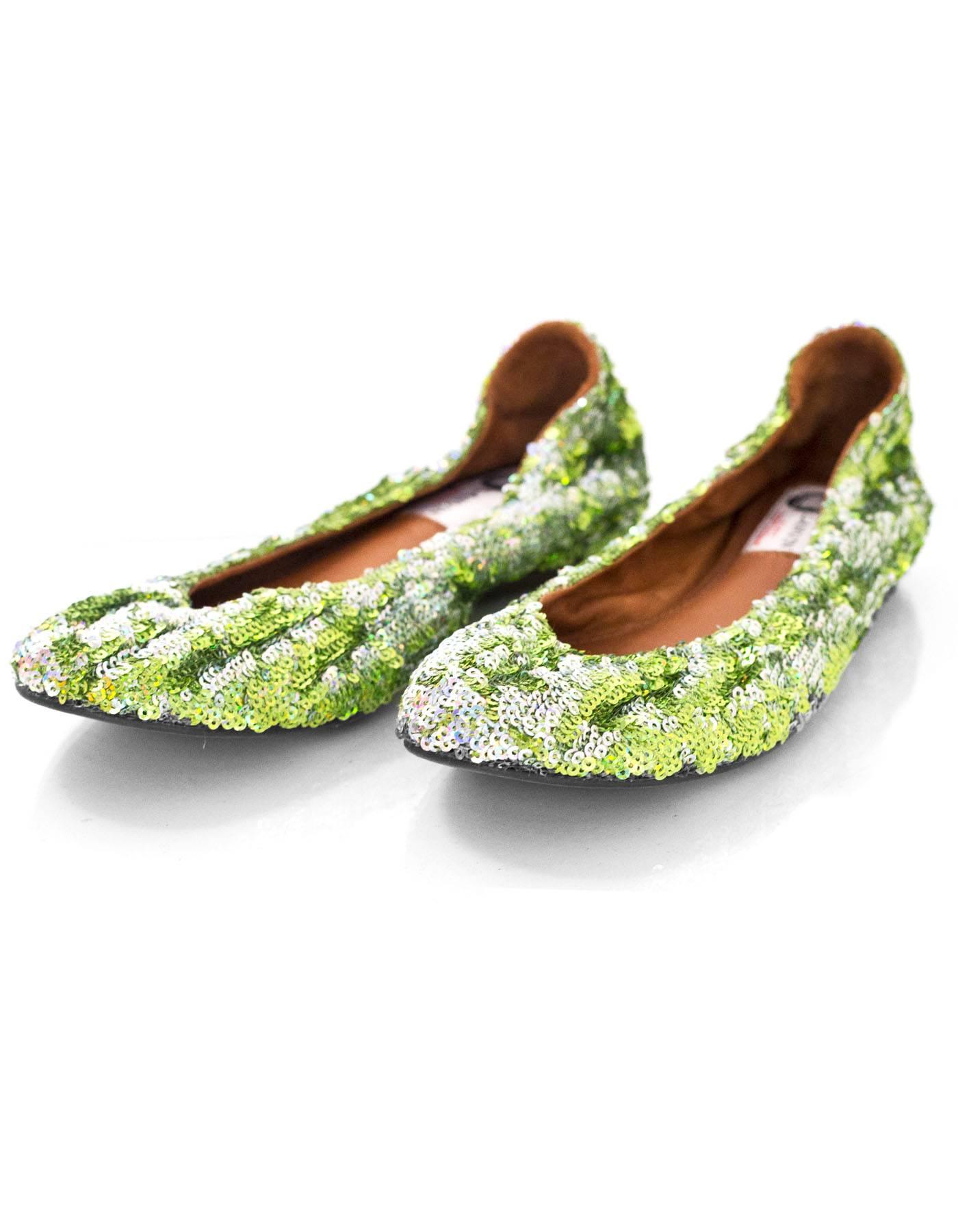Lanvin Green Sequin Flats Sz 38.5 NEW

Made In: Portugal
Color: Green
Materials: Sequin
Closure/Opening: Slide on
Sole Stamp: Lanvin Paris 38.5
Overall Condition: Excellent pre-owned condition, NEW
Included: Lanvin dust bag
Marked Size: 38.5
Heel