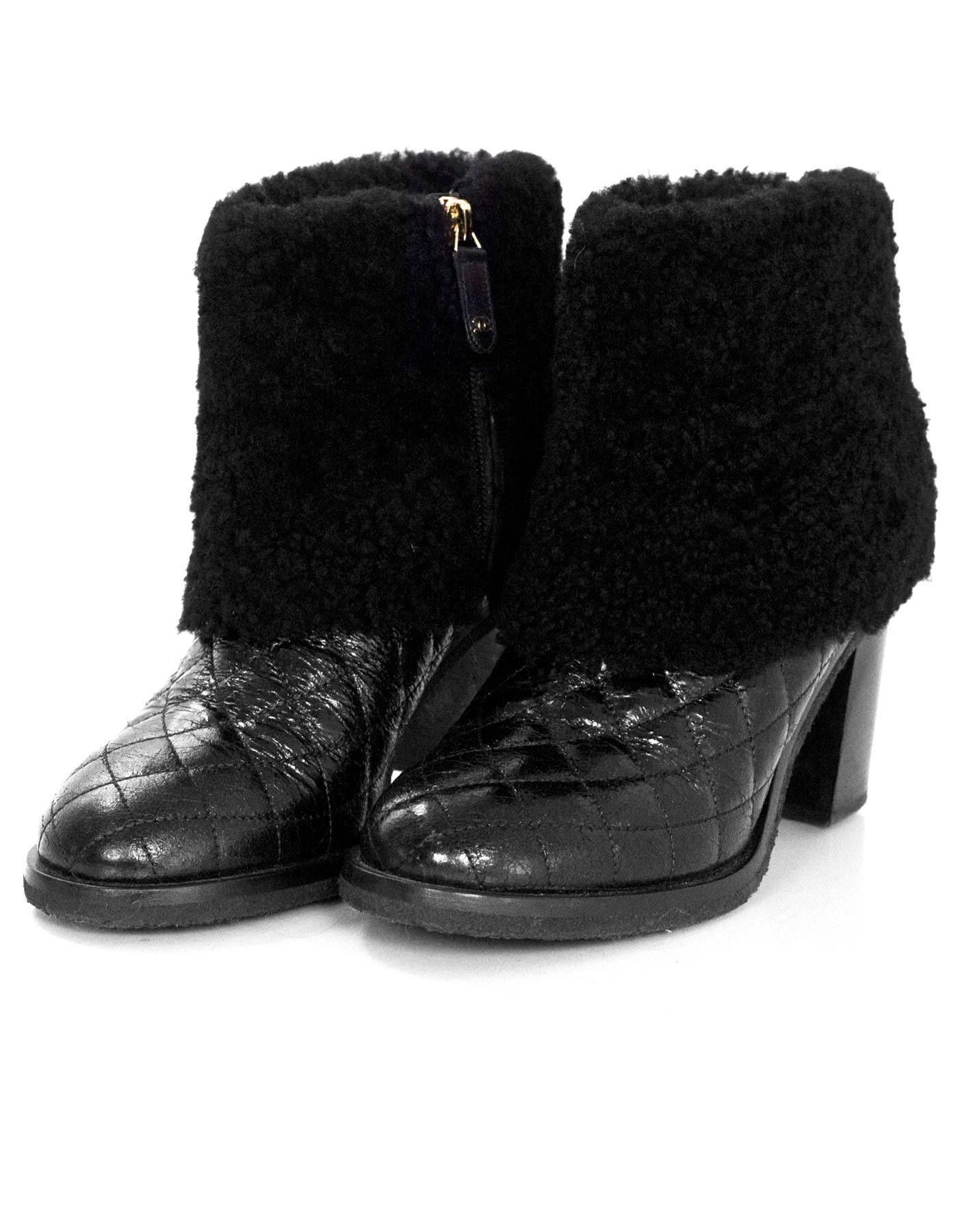 Chanel Black Quilted Shearling Ankle Boots Sz 37

Made In: Italy
Color: Black
Materials: Shearling, leather
Closure/Opening: Side zip closure 
Sole Stamp: Chanel Made in Italy 37
Overall Condition: Excellent pre-owned condition with the exception of