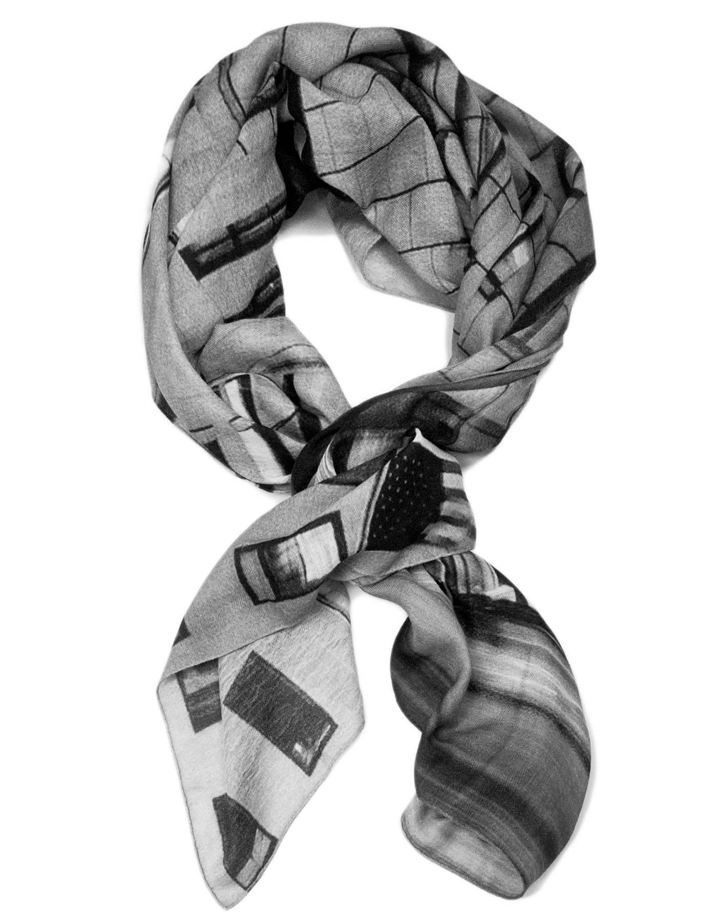 Made exclusively for Bergdorf Goodman to celebrate their 111th Anniversary

Color: Black, grey
Composition: 85% Cashmere, 15% silk
Overall Condition: Excellent pre-owned condition

Measurements:
Length: 50"
Width: 50"