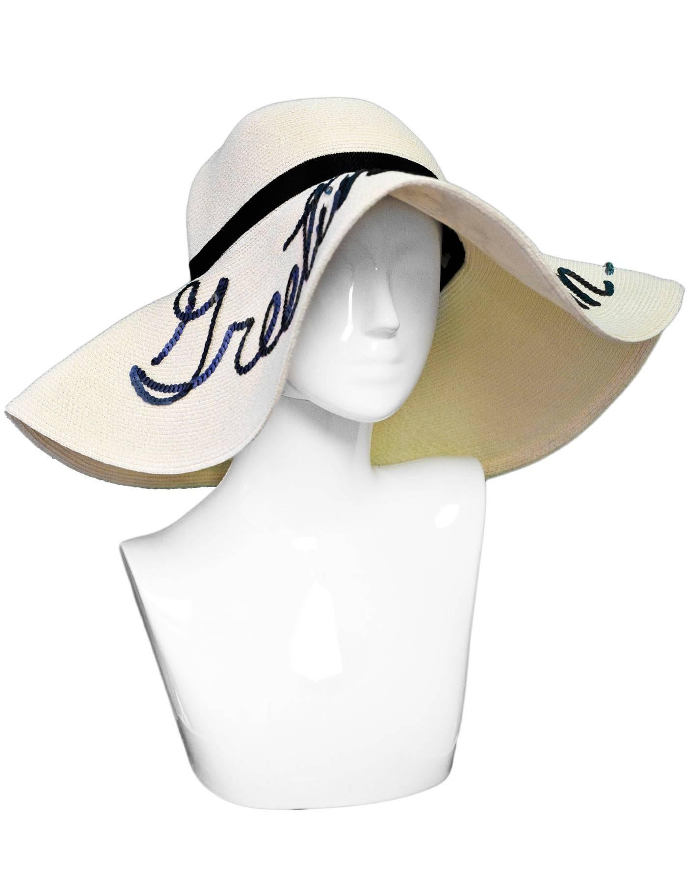 Eugenia Kim Cream Greetings From... Floppy Sun Hat
Features sequin detail

Made In: USA
Color: Cream
Materials: 57% Paper, 14% polypropylene, 29% polyester
Retail Price: $495 + tax
Overall Condition: Excellent pre-owned condition

Measurements: