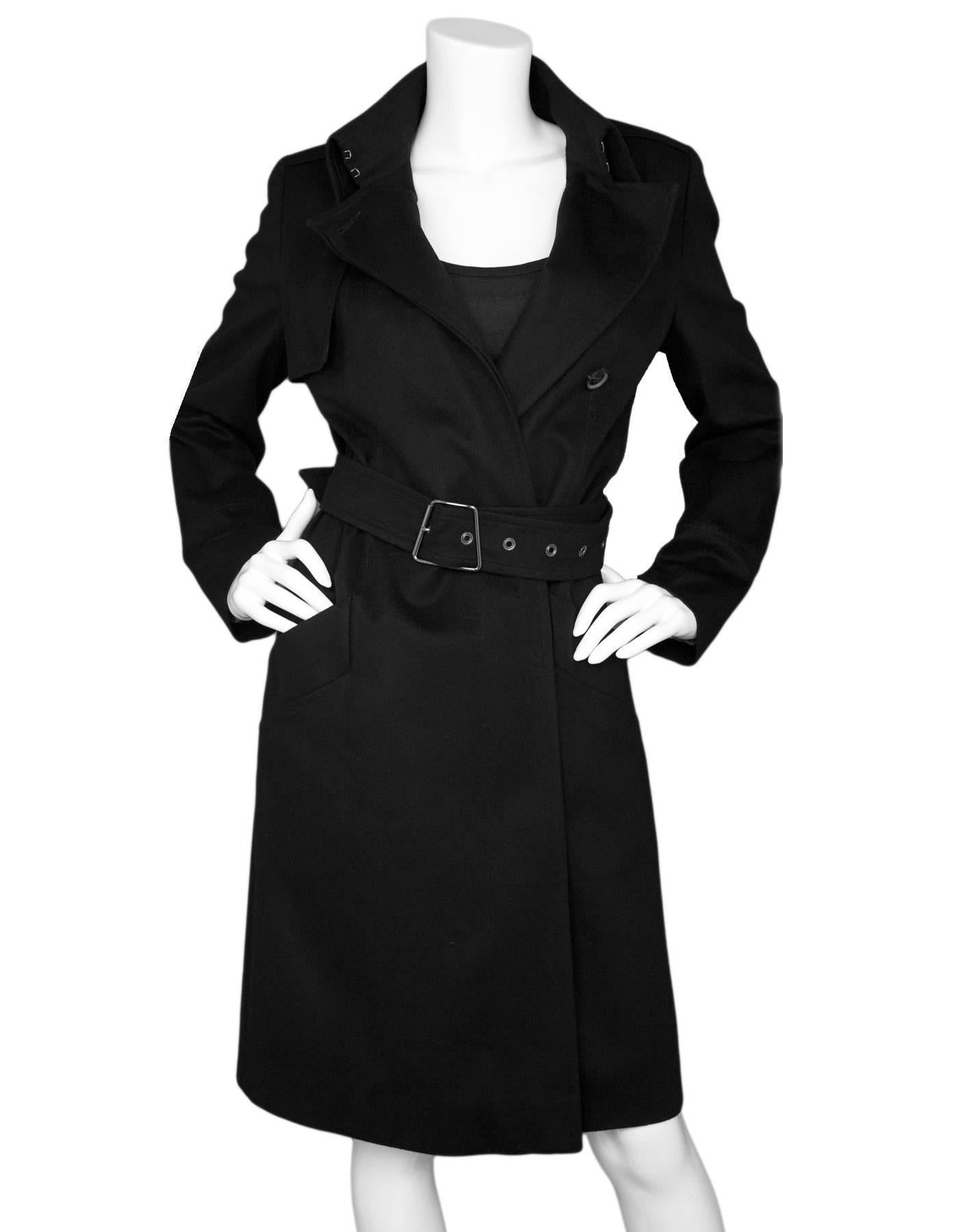 Akris Black Cashmere Exclusive Bergdorf Goodman 111th Anniversary Coat Sz US 6

Made In: Switzerland
Color: Black
Composition: 100% cashmere
Lining: Black and grey print
Closure/Opening: Front button closure
Exterior Pockets: Side pockets
Overall