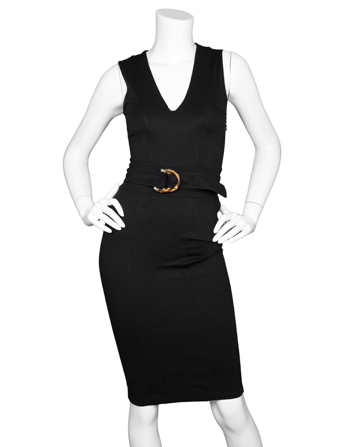 Gucci Black Sleeveless V-Neck Dress With Bamboo Belt Sz XS

Made In: Italy
Color: Black
Composition: Illedgable/faded, feels like nylon blend
Lining: None
Closure/Opening: Side zip closure
Overall Condition: Very good pre-owned condition with the