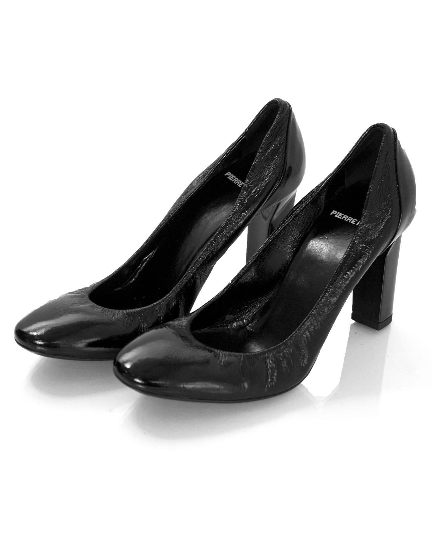 Pierre Hardy Black Patent Leather Pumps Sz 37.5

Made In: Italy
Color: Black
Materials: Patent leather
Closure/Opening: Slide on
Sole Stamp: Pierre Hardy Made in Italy 37.5
Overall Condition: Excellent pre-owned condition, light wear at